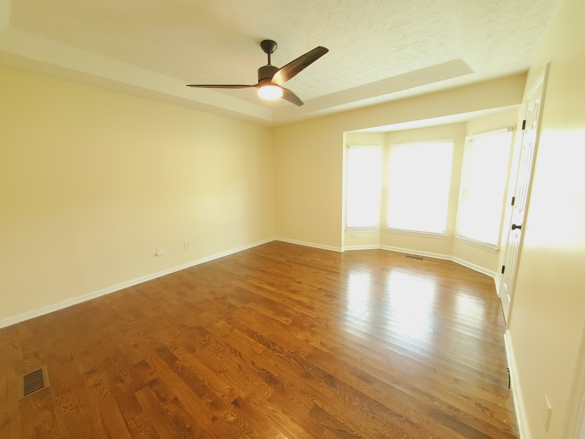 324 West Harper Road Portland, TN 37148 - Photo 9 of 25 a view of empty room with wooden floor and fan