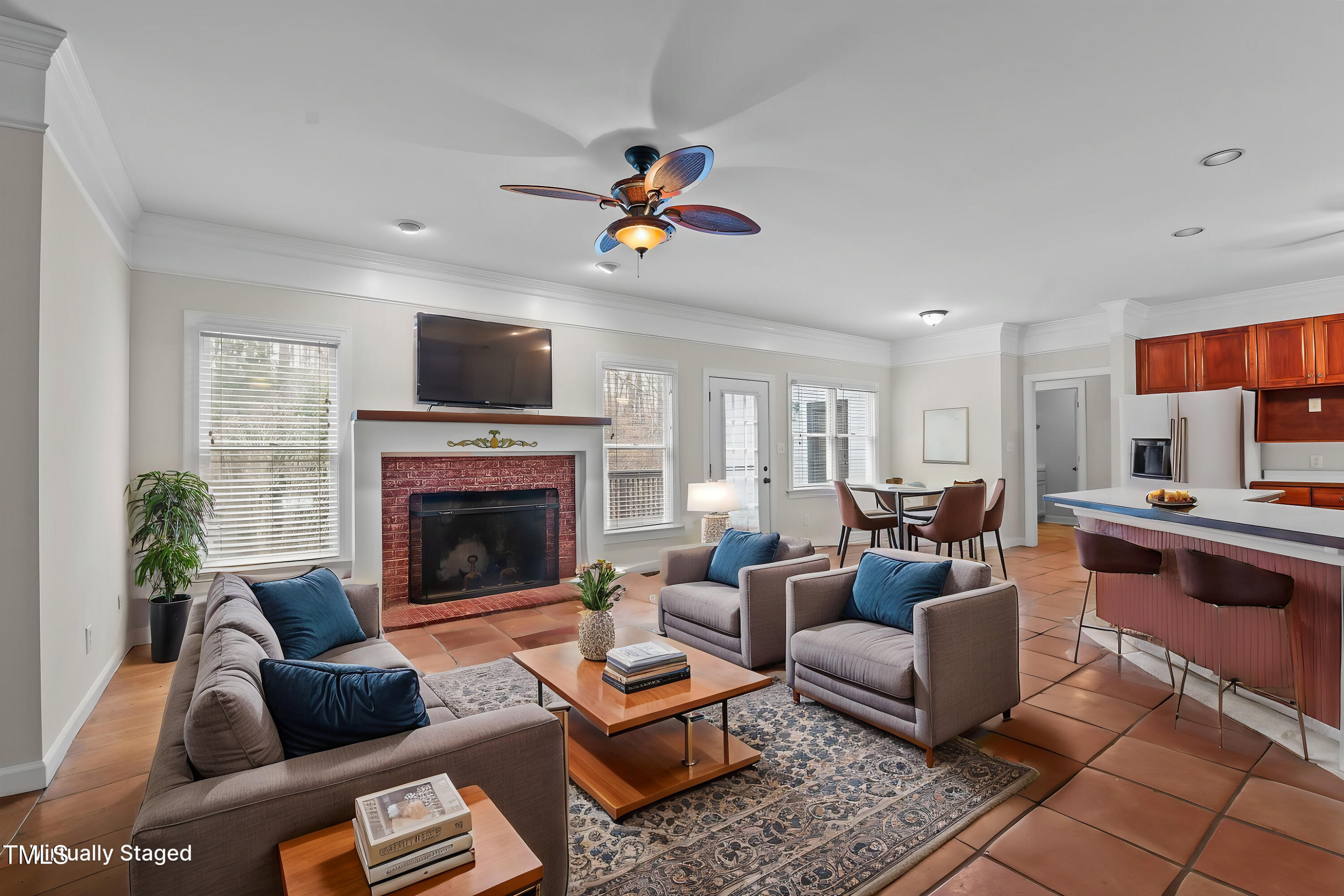 2517 Mt Vernon Church Road Raleigh, NC 27614 - Photo 19 of 45 a living room with furniture a flat screen tv and a fireplace