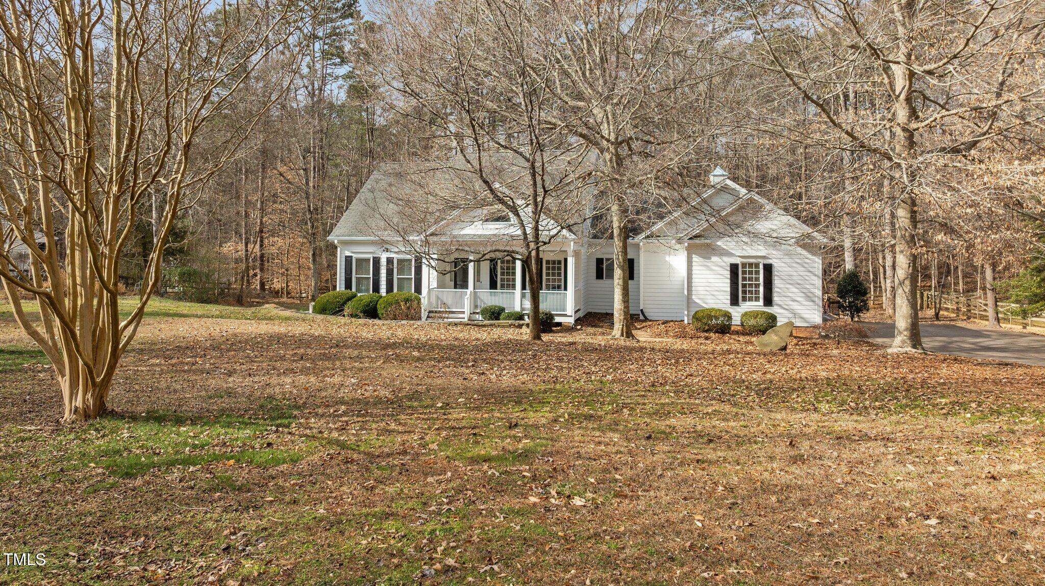 2517 Mt Vernon Church Road Raleigh, NC 27614 - Photo 2 of 45 a front view of a house with a garden