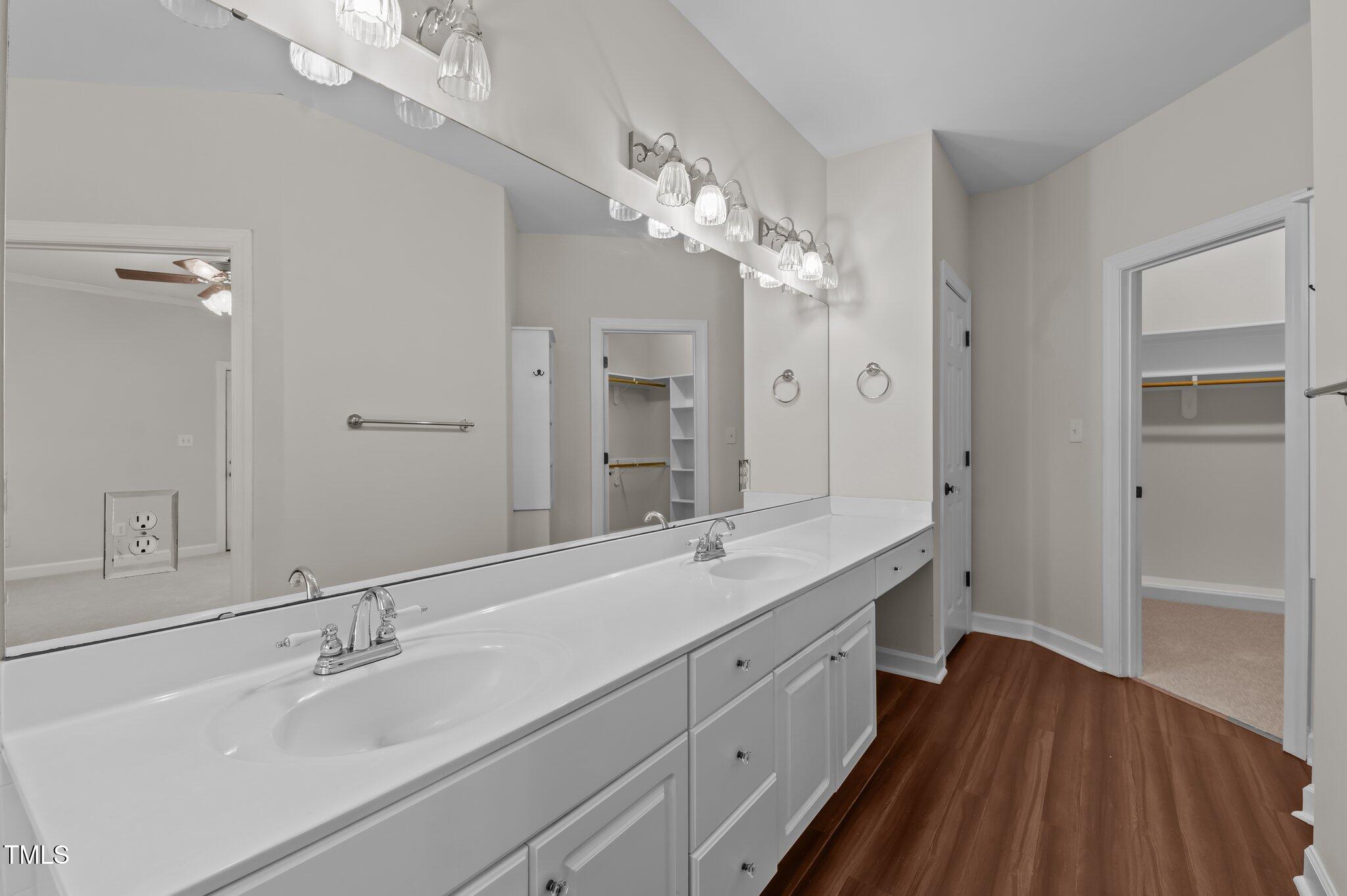 2517 Mt Vernon Church Road Raleigh, NC 27614 - Photo 25 of 45 a spacious bathroom with a double vanity sink double mirror and a shower