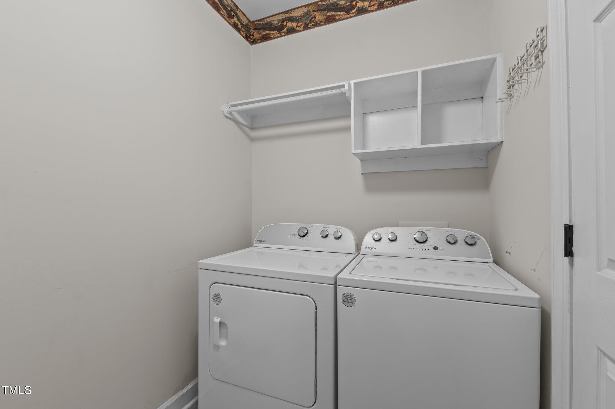 2517 Mt Vernon Church Road Raleigh, NC 27614 - Photo 35 of 45 a utility room with dryer and washer
