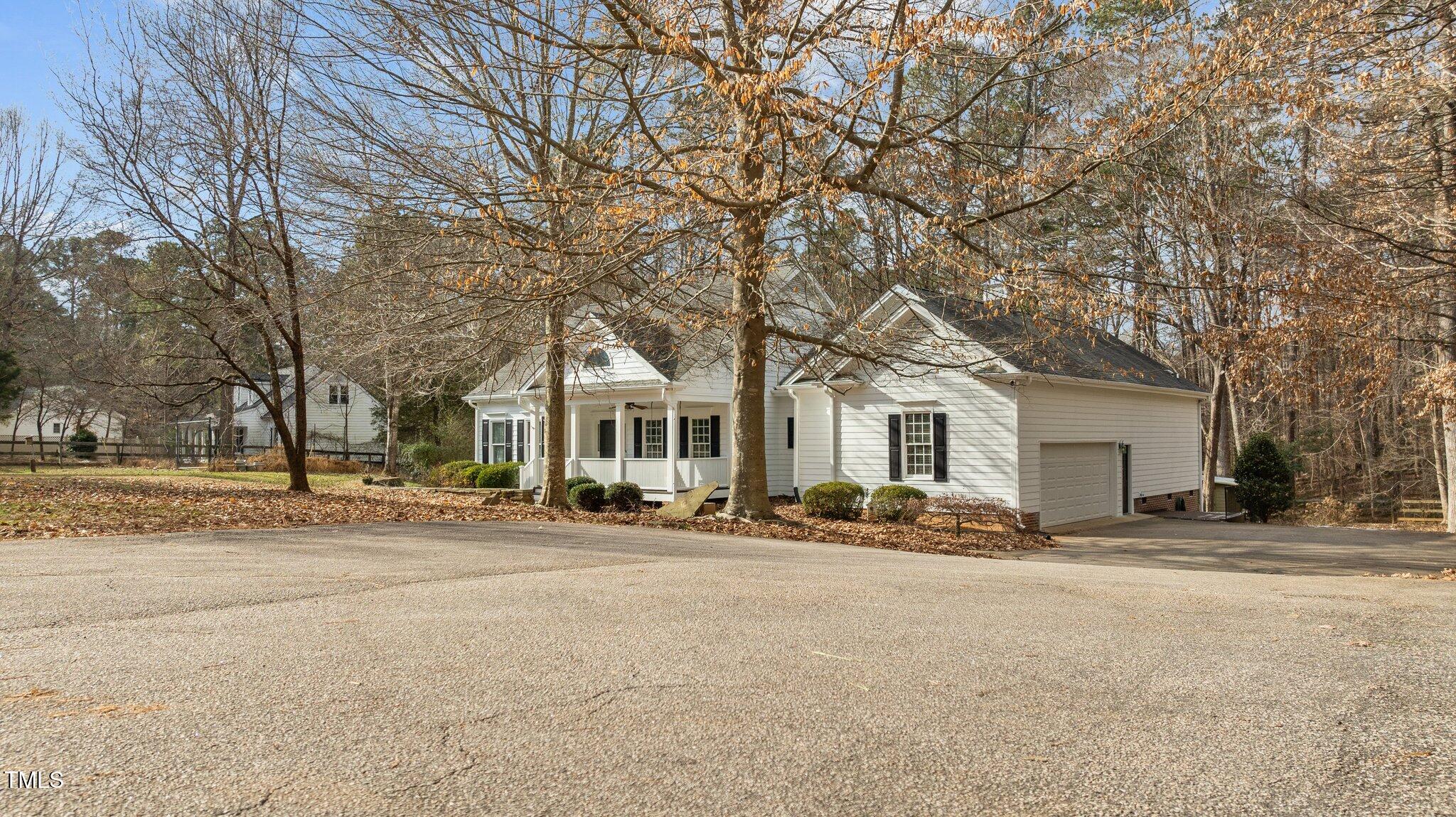 2517 Mt Vernon Church Road Raleigh, NC 27614 - Photo 4 of 45 a front view of a house with a yard