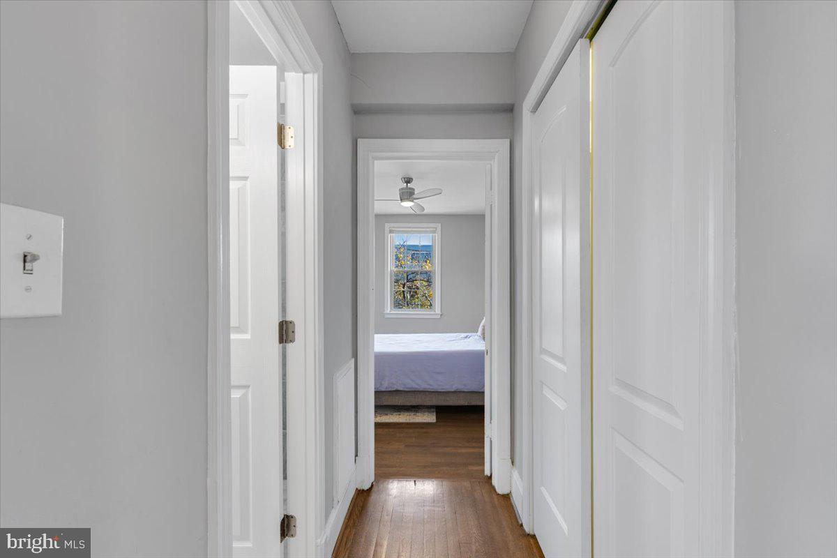 1301 Longfellow Street Northwest, Unit 207 Washington, DC 20011 - Photo 14 of 25 a view of bedroom with wooden floor