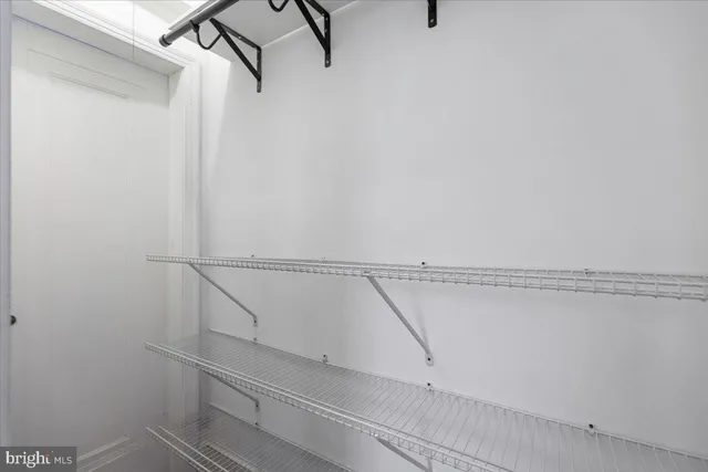 a view of small space with racks on the wall
