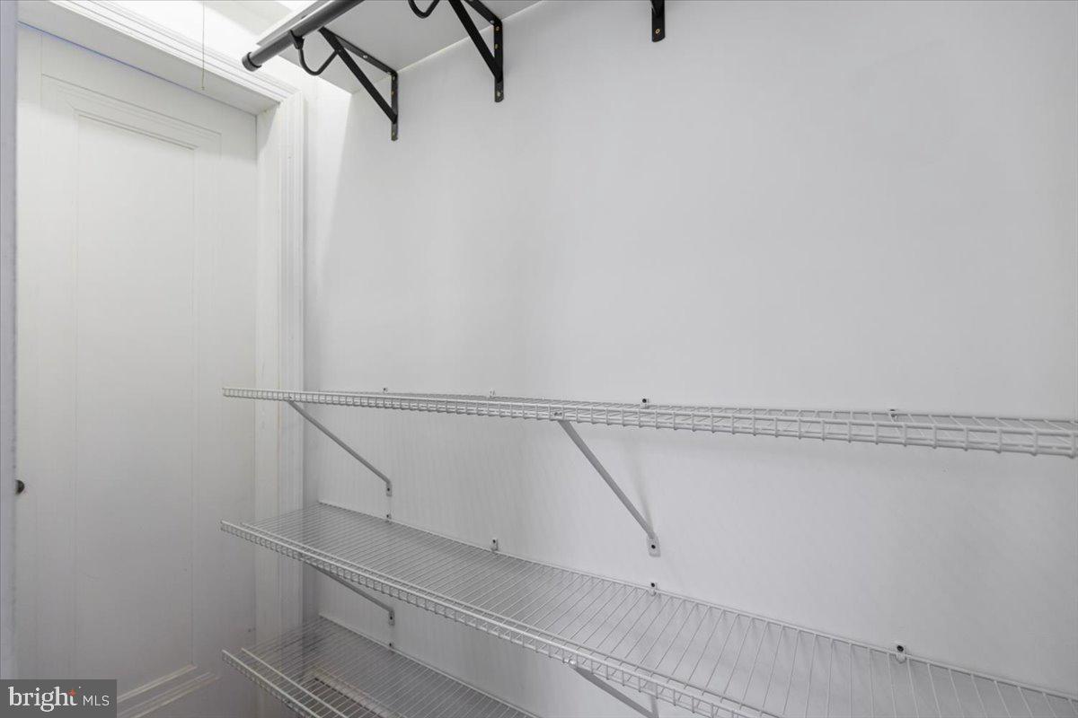 1301 Longfellow Street Northwest, Unit 207 Washington, DC 20011 - Photo 17 of 25 a view of small space with racks on the wall