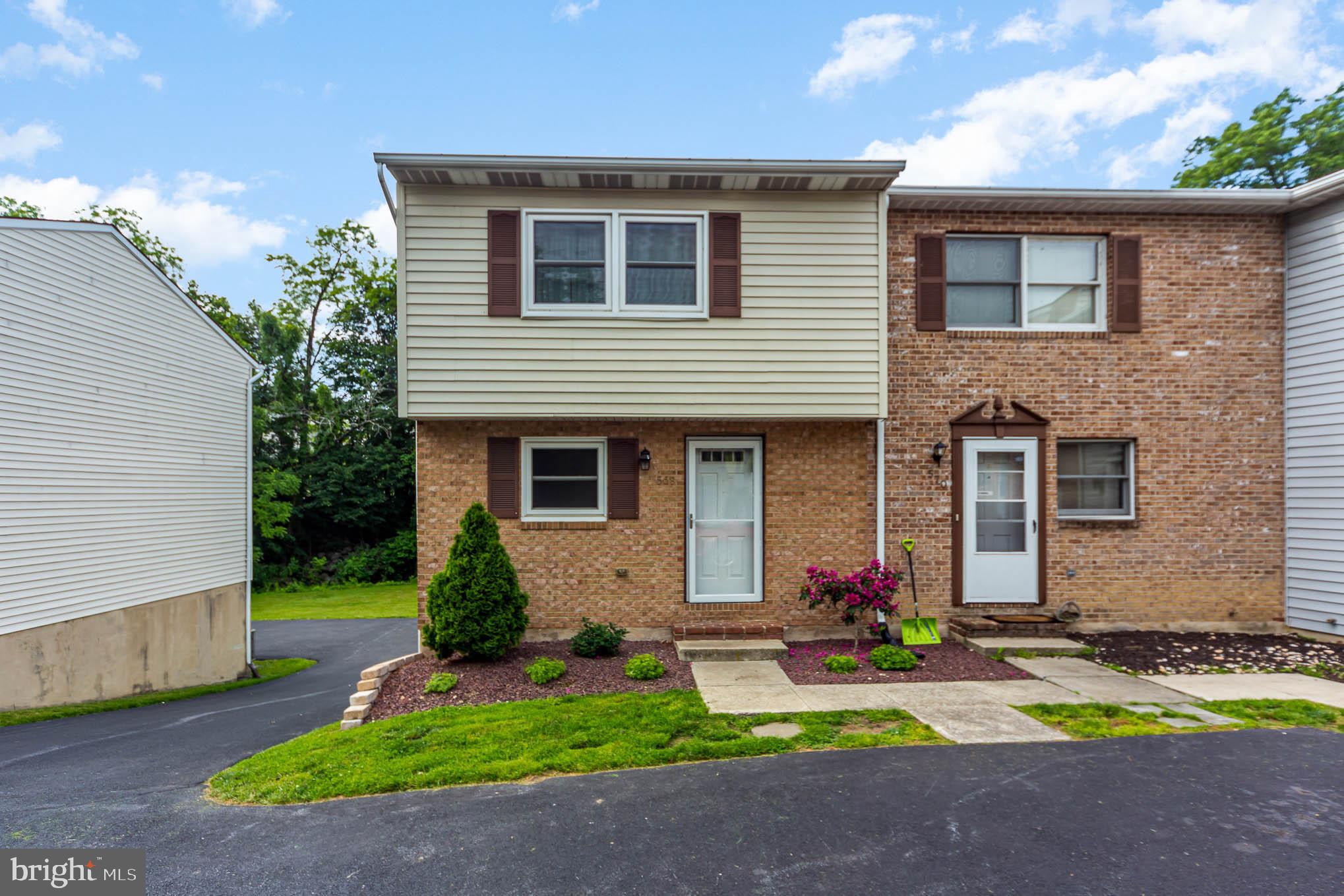 568 Valley Road Enola, PA 17025 - Photo 1 of 27 a front view of house with yard and green space