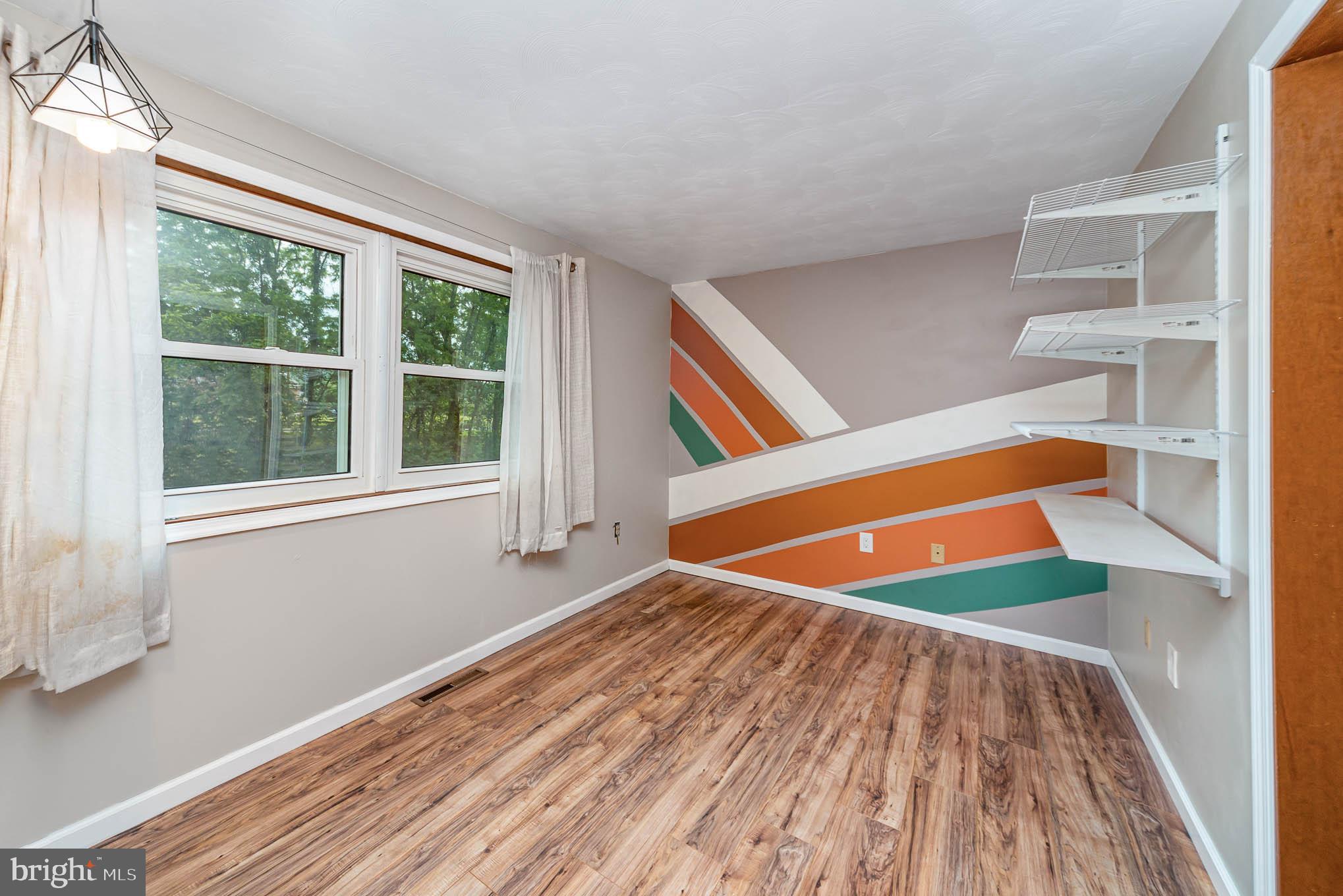 568 Valley Road Enola, PA 17025 - Photo 13 of 27 a view of an empty room with a window