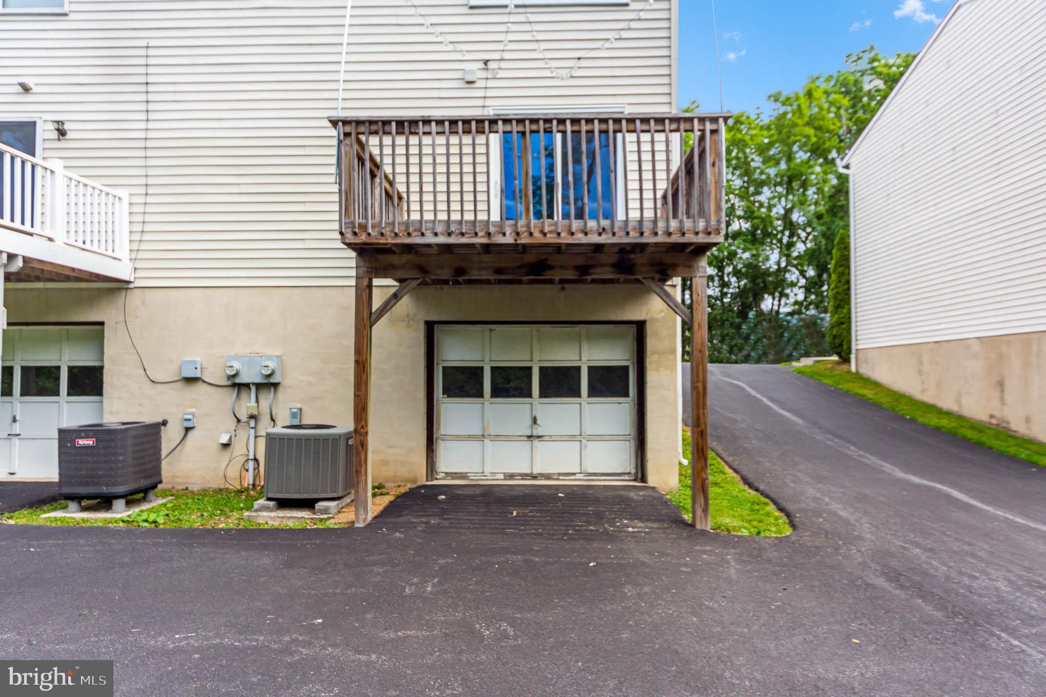 568 Valley Road Enola, PA 17025 - Photo 23 of 27 a front view of a house with garden