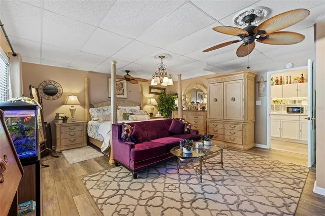 a kitchen with stainless steel appliances a sink and a microwave