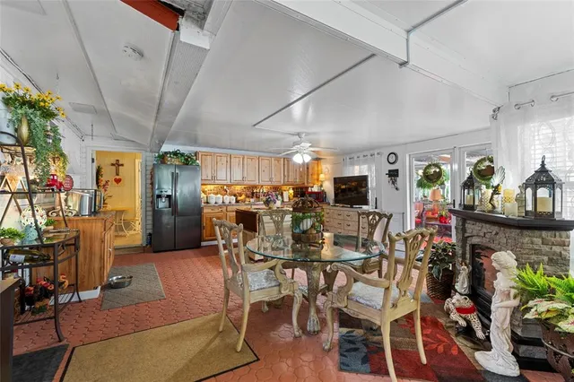 a kitchen with appliances cabinets and a counter top space
