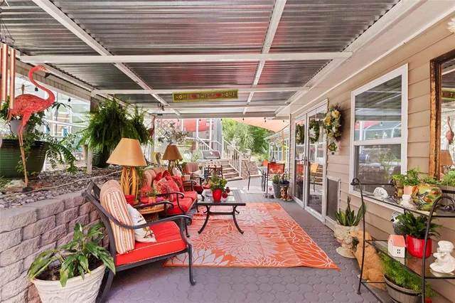 a view of yard with outdoor seating