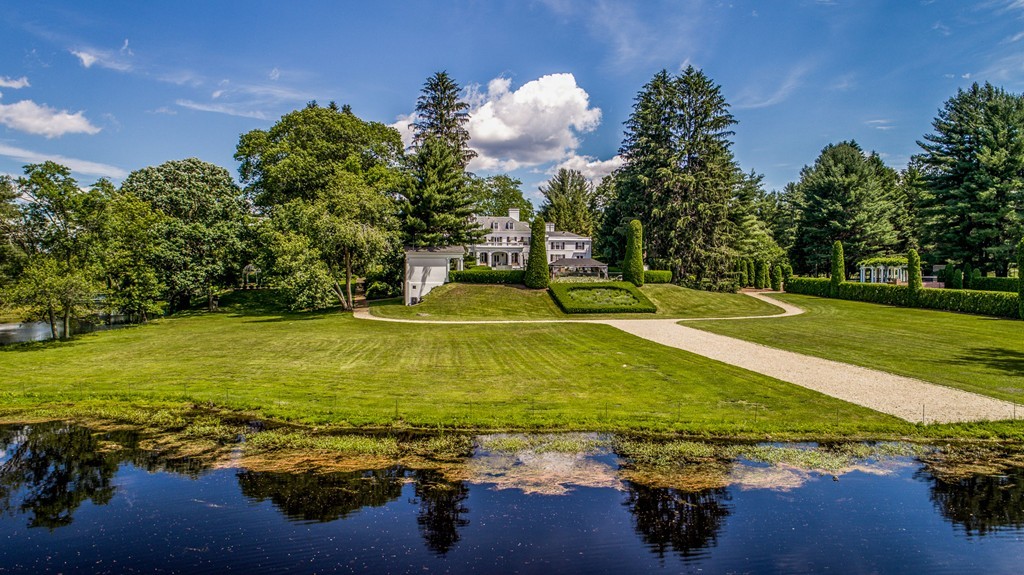 1075 Lowell Road Concord, MA 01742 - Photo 11 of 26 a view of a lake with houses