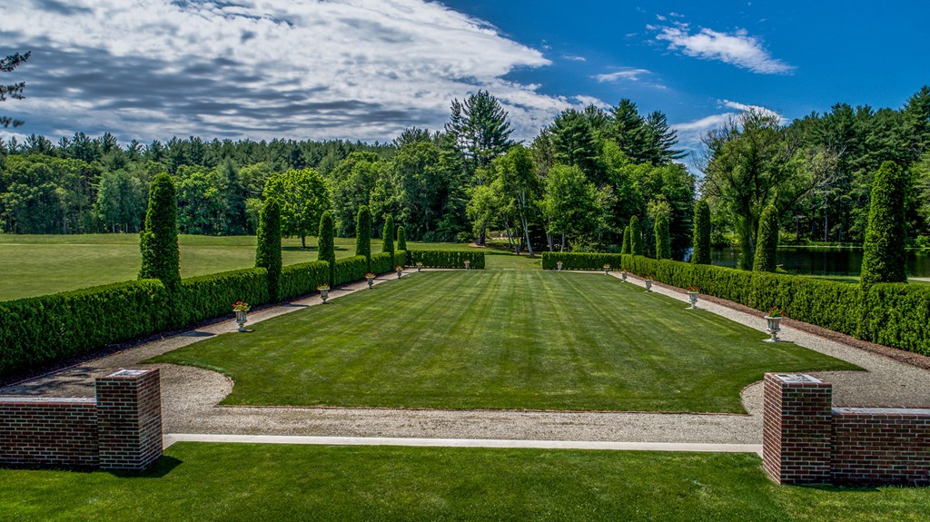 1075 Lowell Road Concord, MA 01742 - Photo 13 of 26 a view of a backyard with a garden