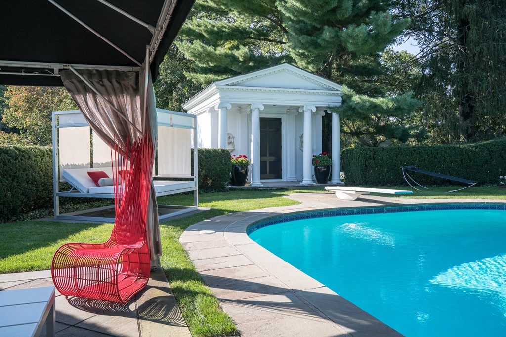 1075 Lowell Road Concord, MA 01742 - Photo 18 of 26 a front view of house with yard swimming pool and outdoor seating
