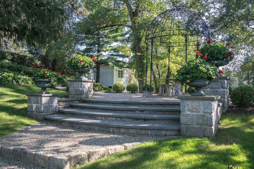 1075 Lowell Road Concord, MA 01742 - Photo 19 of 26 a view of garden with a bench