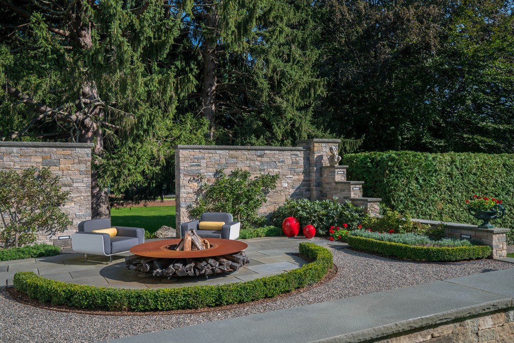 1075 Lowell Road Concord, MA 01742 - Photo 22 of 26 a view of a garden with a fountain