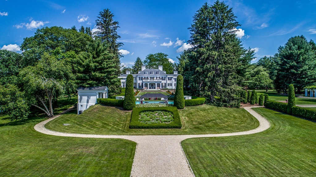 1075 Lowell Road Concord, MA 01742 - Photo 3 of 26 a view of a play ground in front of a house