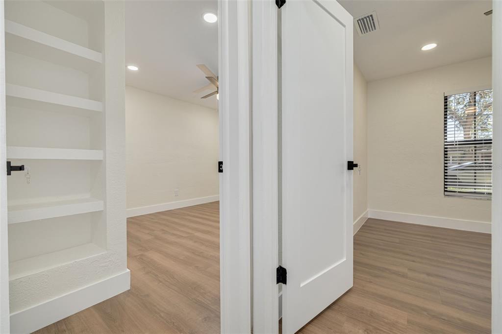 2034 58th Way North Clearwater, FL 33760 - Photo 23 of 35 a view of hallway with wooden floor