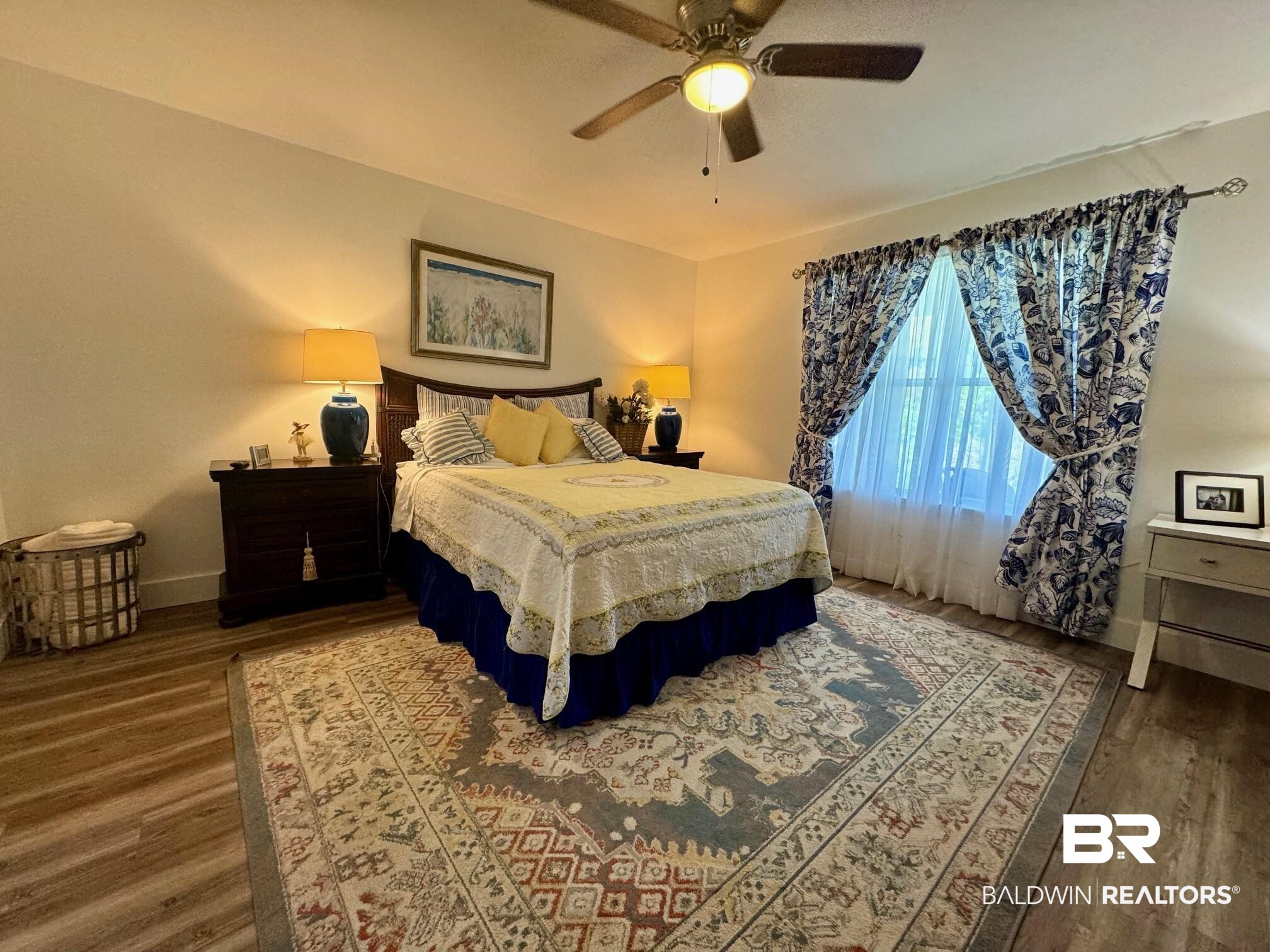 3200 Loop Road, Unit 55 Orange Beach, AL 36561 - Photo 13 of 40 Bedroom featuring ceiling fan and dark hardwood / wood-style flooring