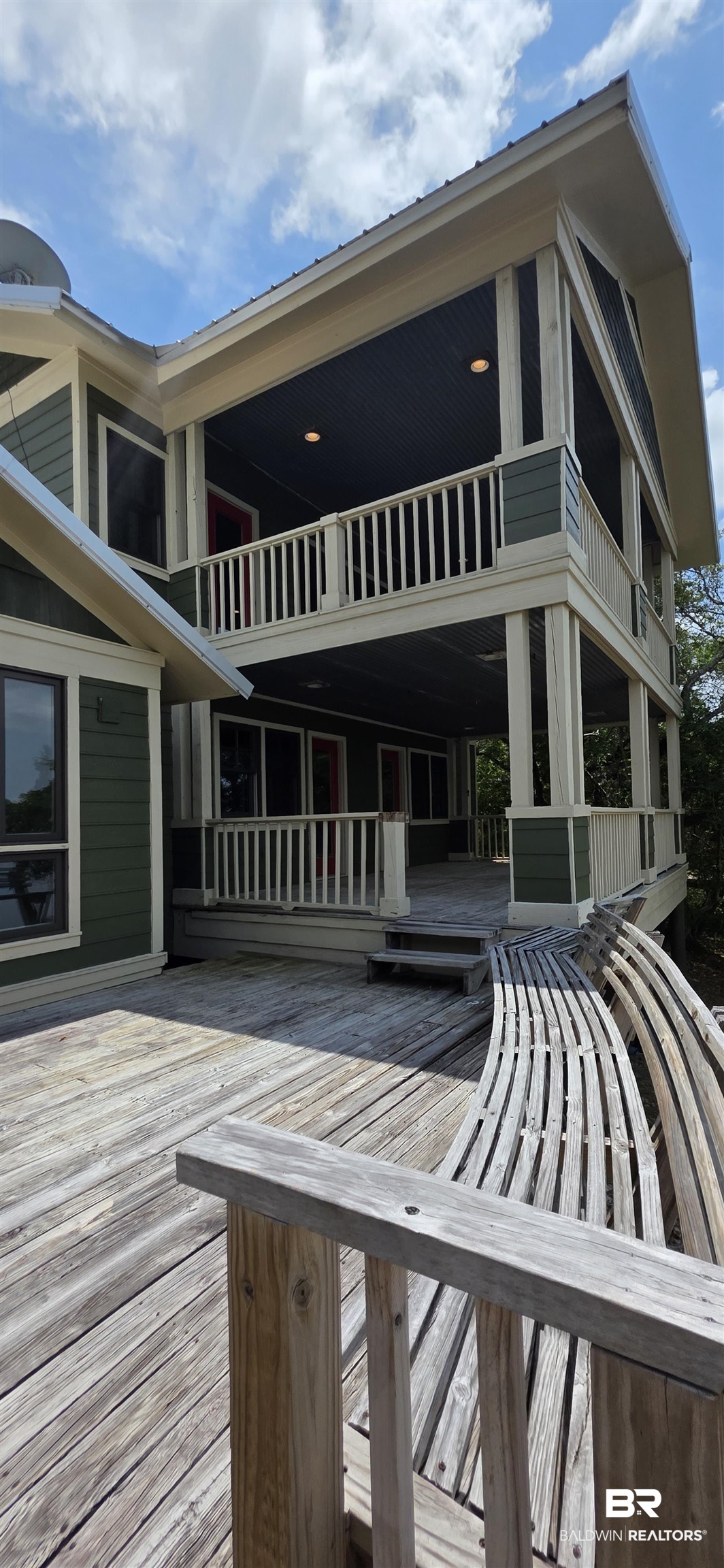 544 Windmill Ridge Road Gulf Shores, AL 36542 - Photo 11 of 50 View from steps looking up towards 2 story balconies off of bedrooms