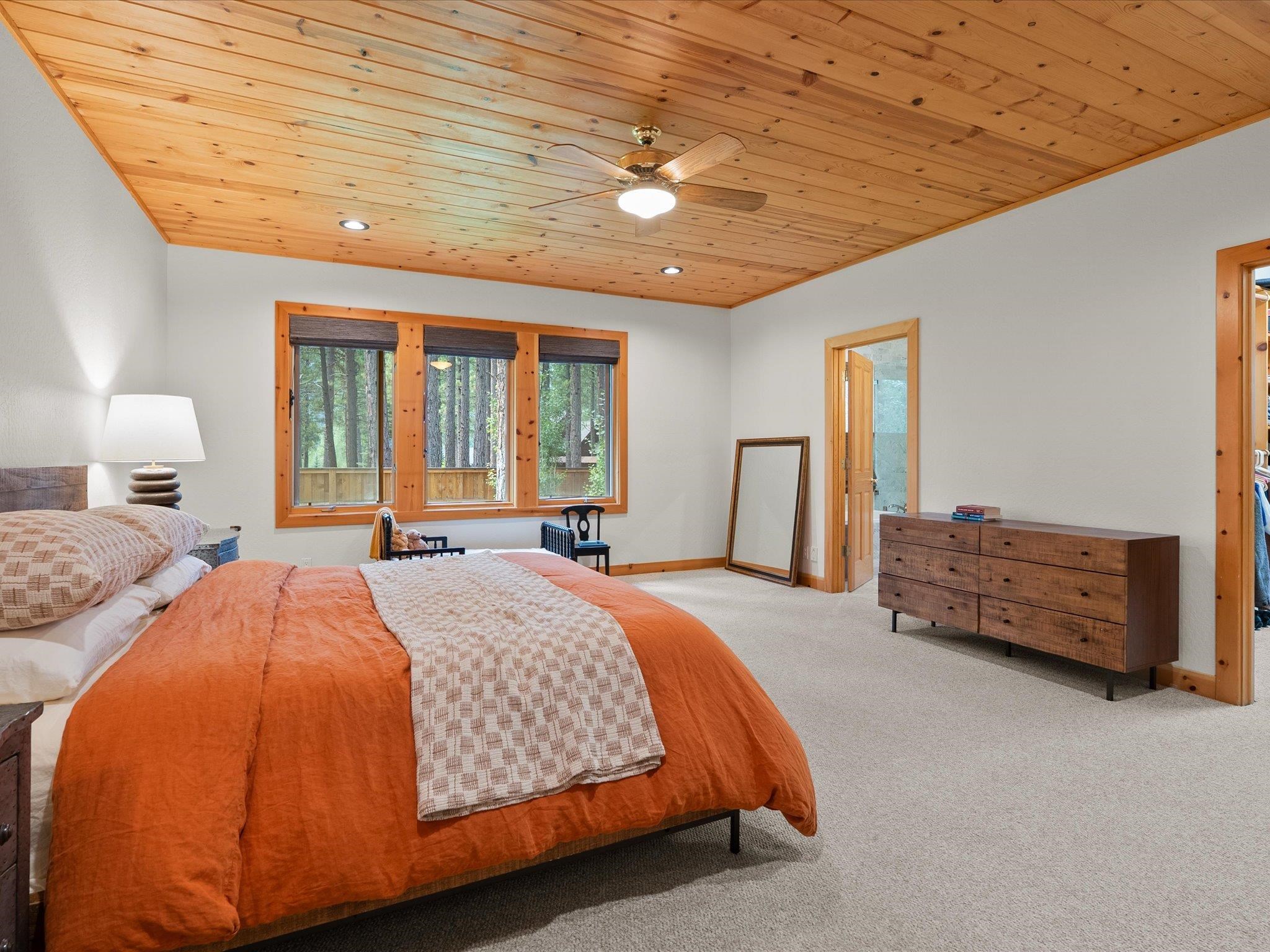 355 Quail View Circle Clio, CA 96106 - Photo 29 of 48 a bedroom with a bed and a dresser