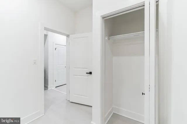 a view of a kitchen with washer and dryer