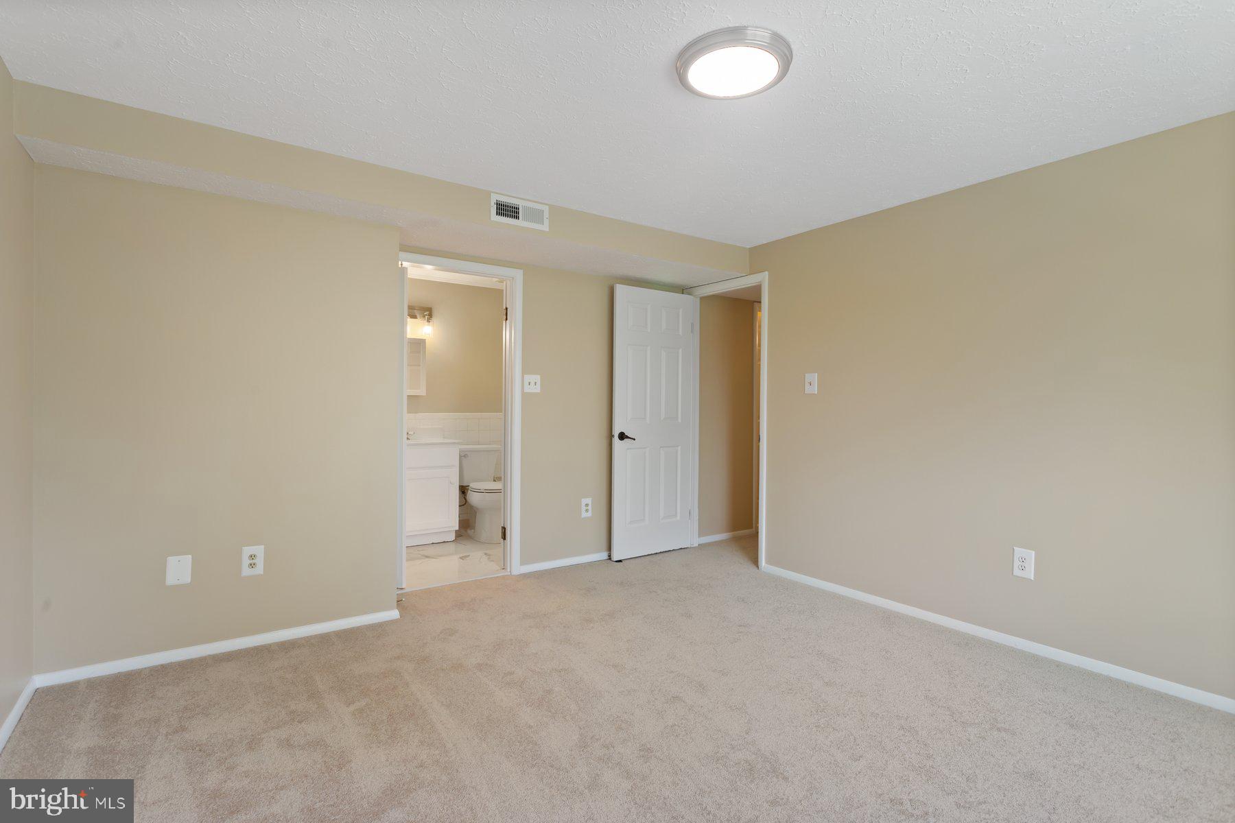 731 Heather Ridge Drive Frederick, MD 21702 - Photo 16 of 26 an empty room with an entryway