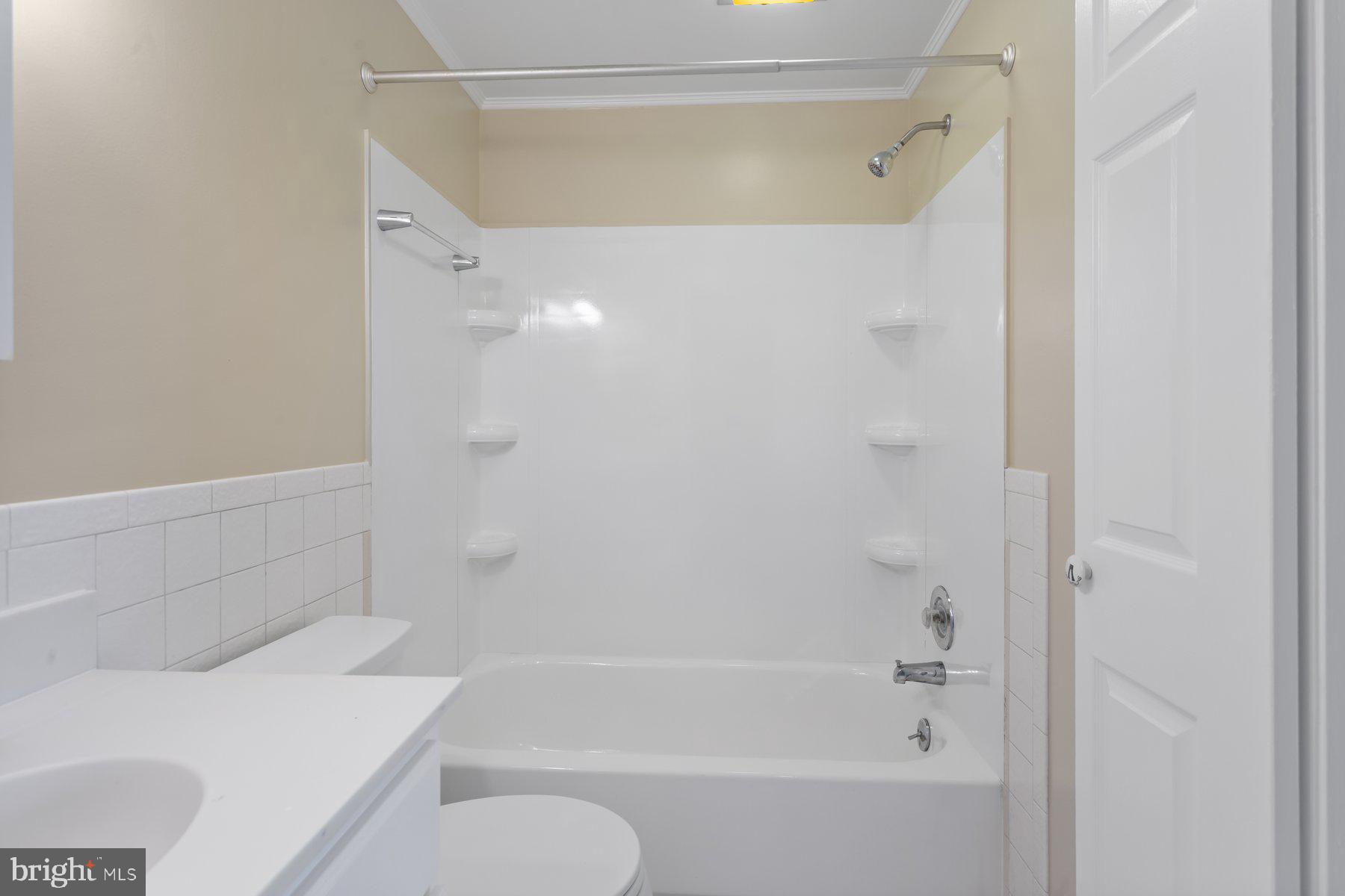731 Heather Ridge Drive Frederick, MD 21702 - Photo 19 of 26 a bathroom with a bathtub and a shower