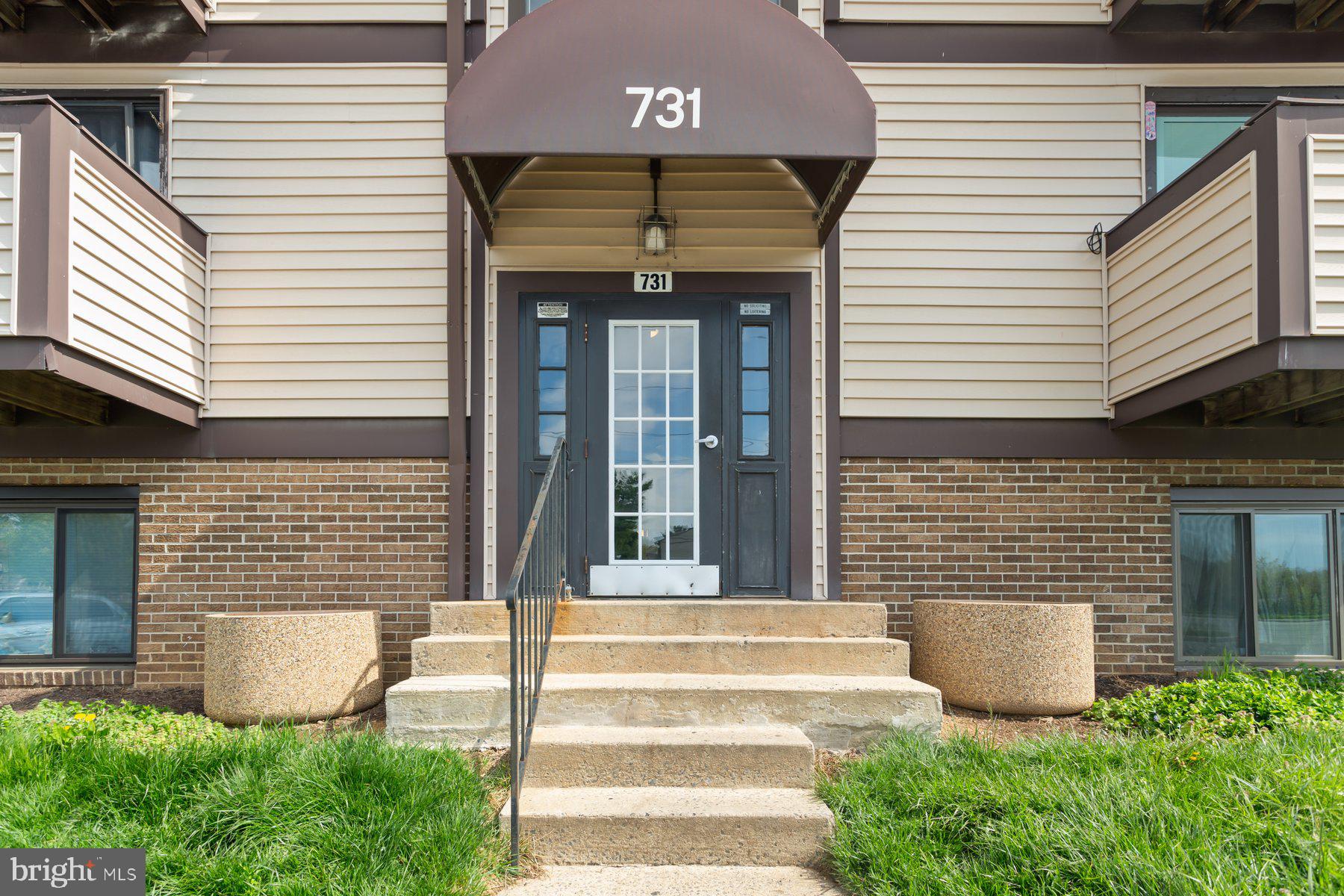 731 Heather Ridge Drive Frederick, MD 21702 - Photo 2 of 26 a front view of a house with plants