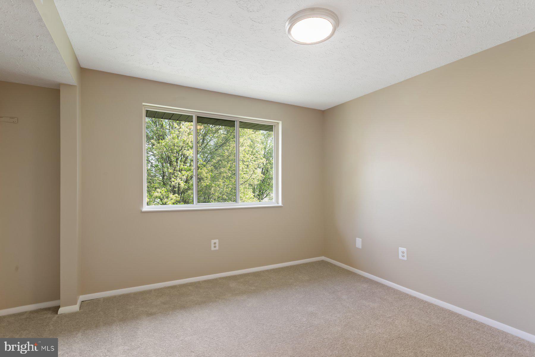 731 Heather Ridge Drive Frederick, MD 21702 - Photo 21 of 26 an empty room with a window