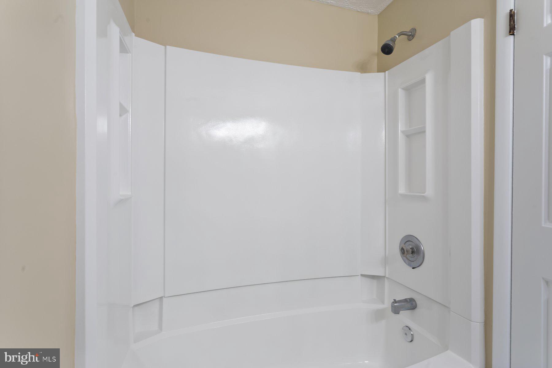 731 Heather Ridge Drive Frederick, MD 21702 - Photo 24 of 26 a bathroom with a bathtub