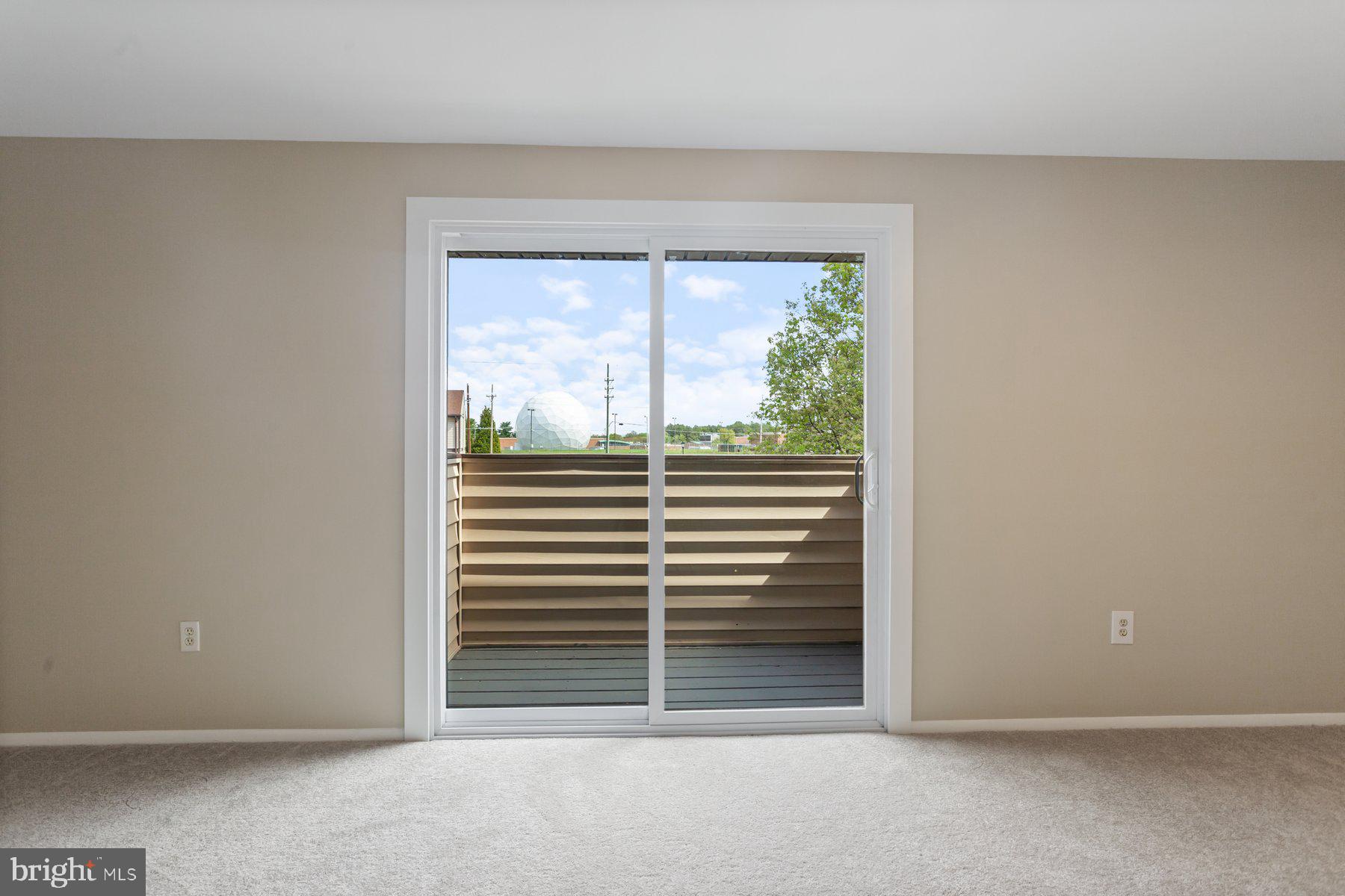 731 Heather Ridge Drive Frederick, MD 21702 - Photo 7 of 26 a view of a house with a large window