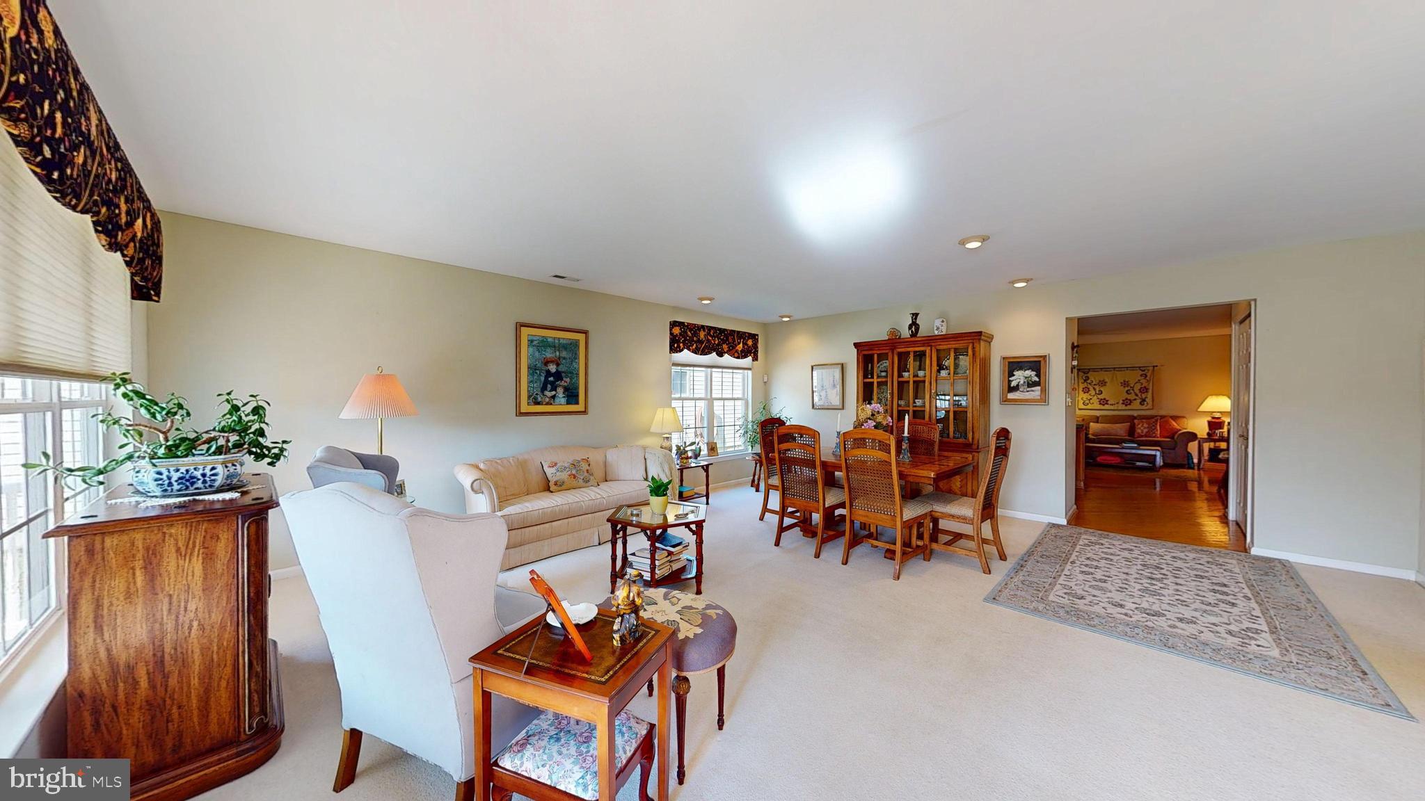 15 Carriage Berlin, NJ 08009 - Photo 11 of 61 a living room with furniture and wooden floor