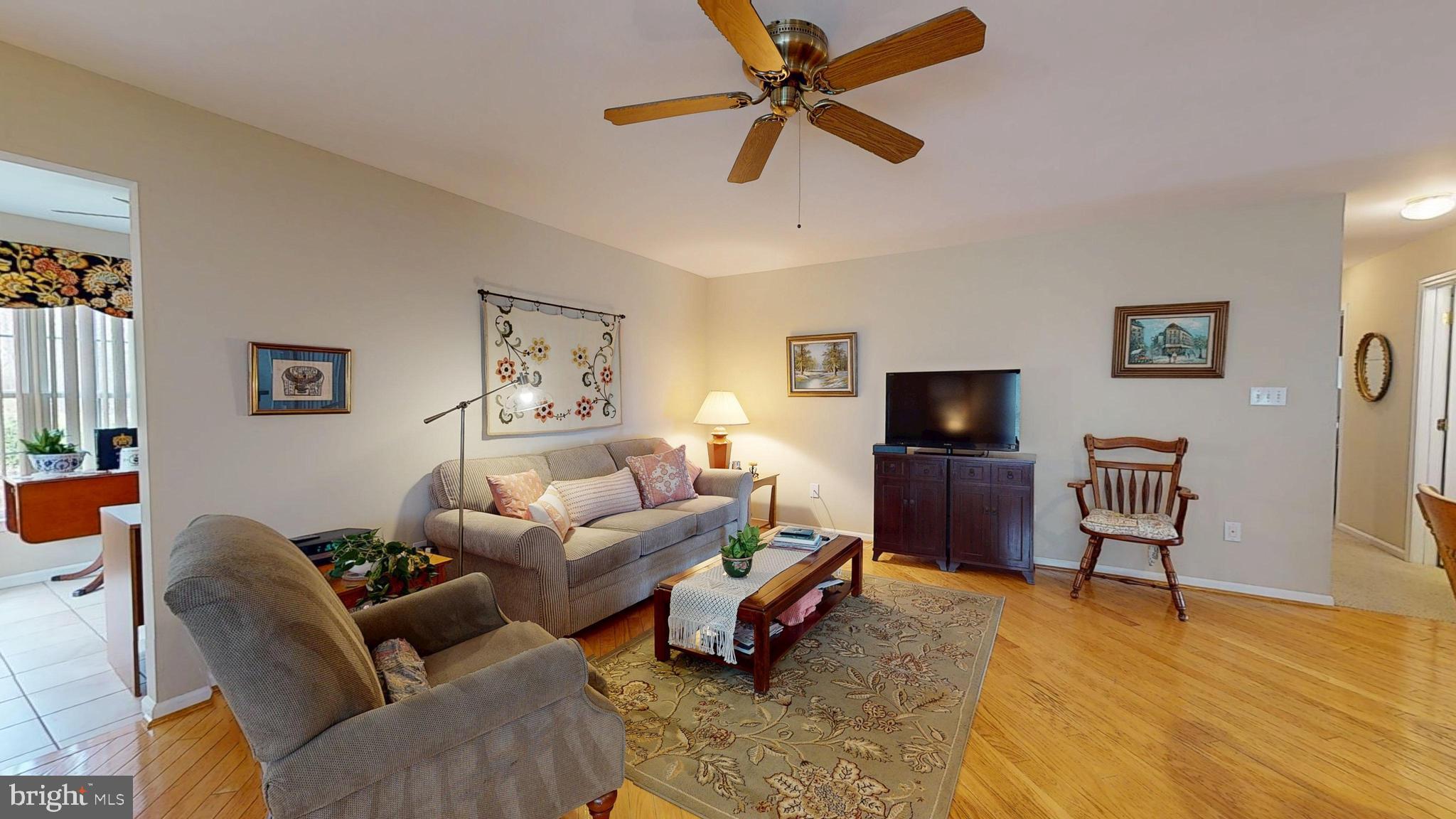 15 Carriage Berlin, NJ 08009 - Photo 14 of 61 a living room with furniture and a flat screen tv
