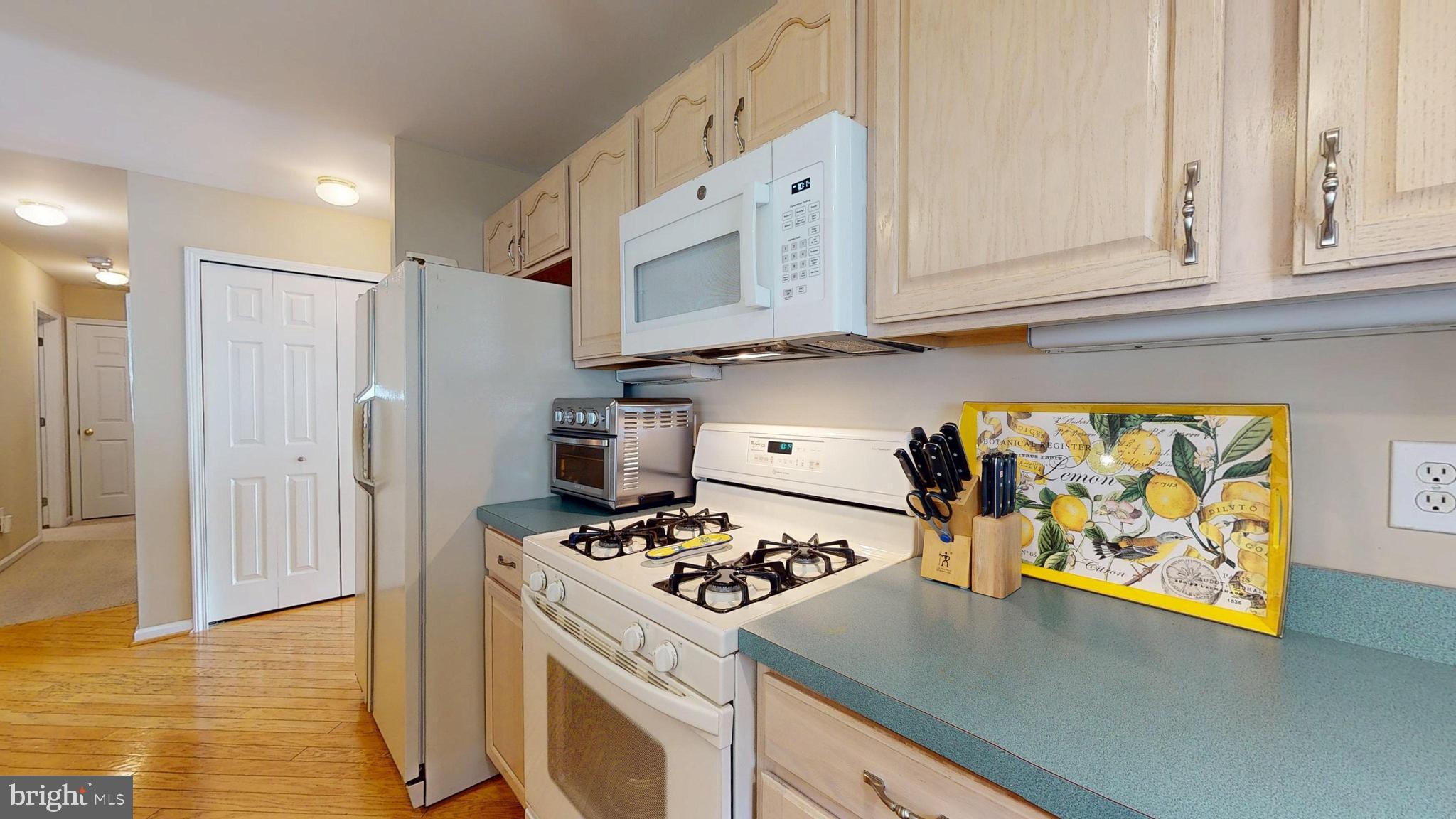15 Carriage Berlin, NJ 08009 - Photo 17 of 61 a kitchen with stainless steel appliances granite countertop a refrigerator and a stove