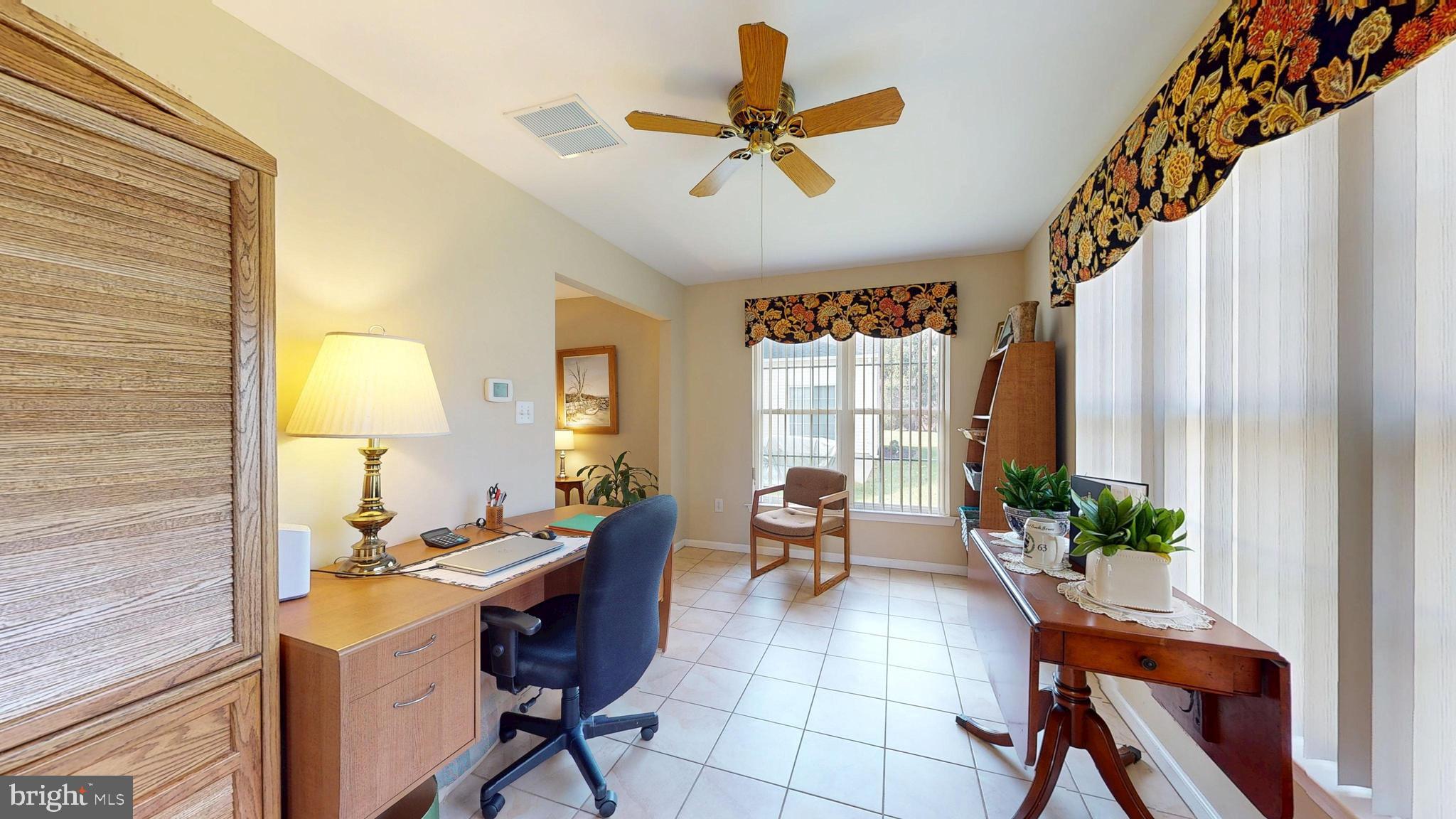 15 Carriage Berlin, NJ 08009 - Photo 29 of 61 a view of a workspace with furniture and a window