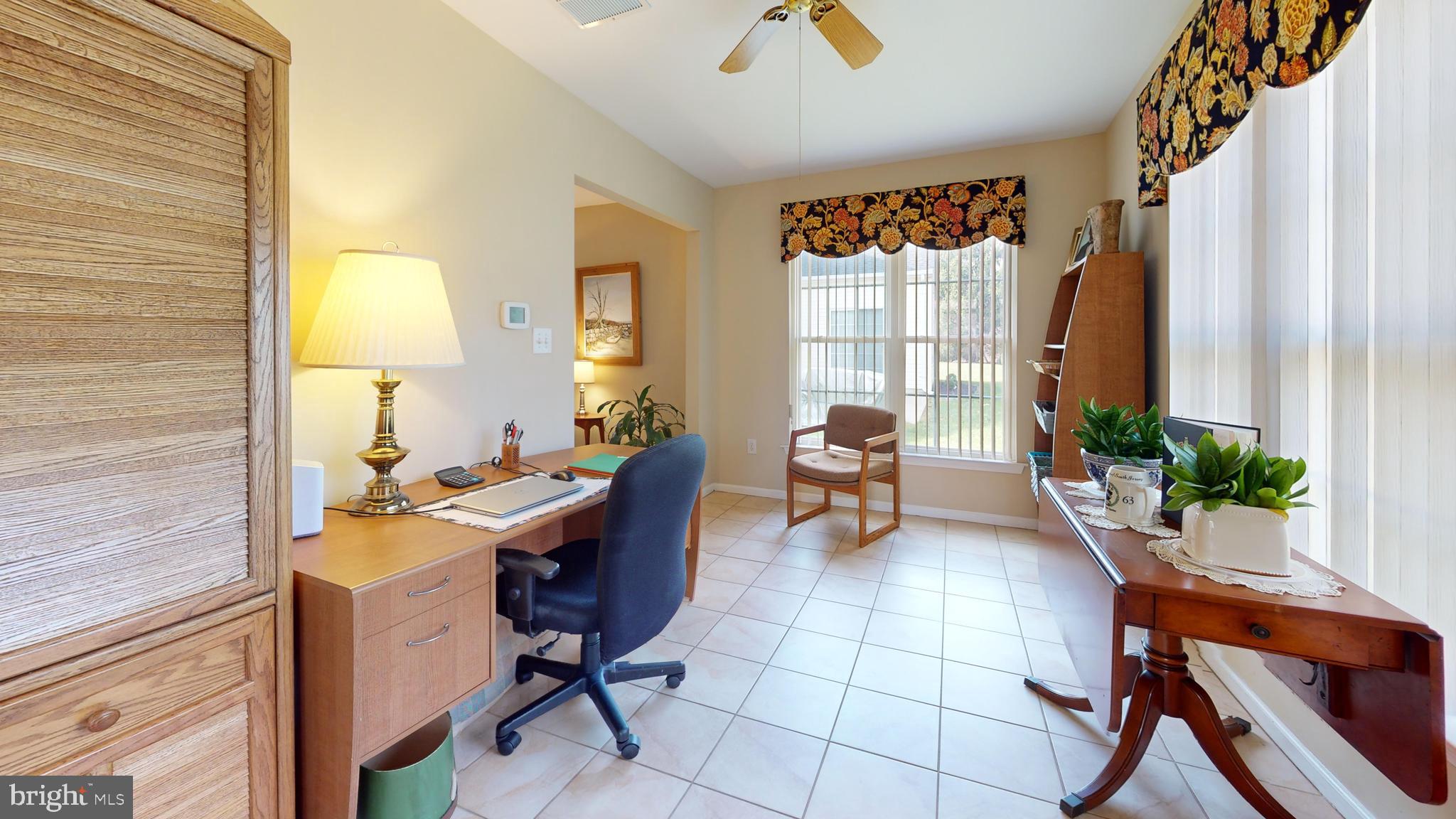 15 Carriage Berlin, NJ 08009 - Photo 30 of 61 a view of a workspace with furniture and a window