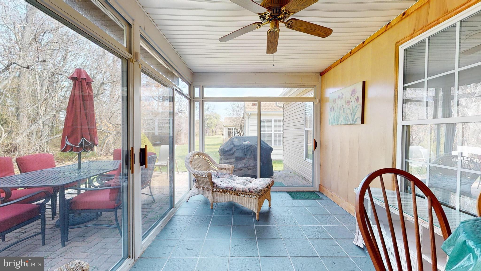 15 Carriage Berlin, NJ 08009 - Photo 32 of 61 a living room with furniture and a large window