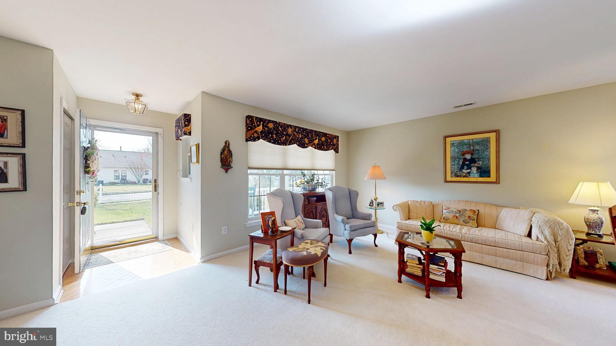 15 Carriage Berlin, NJ 08009 - Photo 4 of 61 a living room with furniture and a window