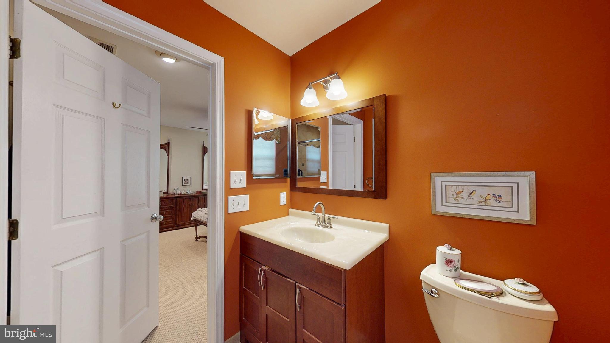 15 Carriage Berlin, NJ 08009 - Photo 46 of 61 a bathroom with a sink vanity mirror and toilet