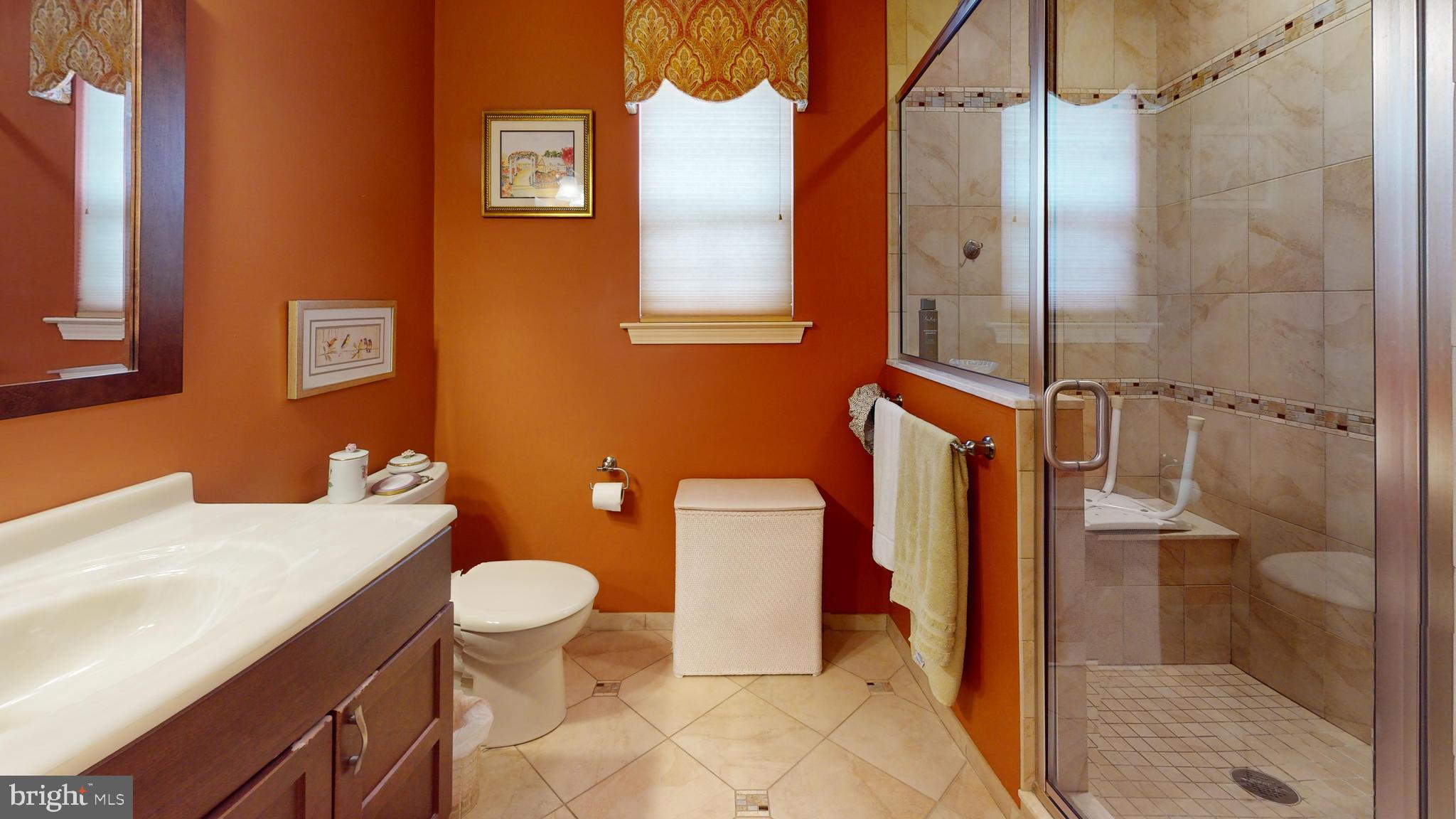 15 Carriage Berlin, NJ 08009 - Photo 47 of 61 a bathroom with a sink toilet and shower