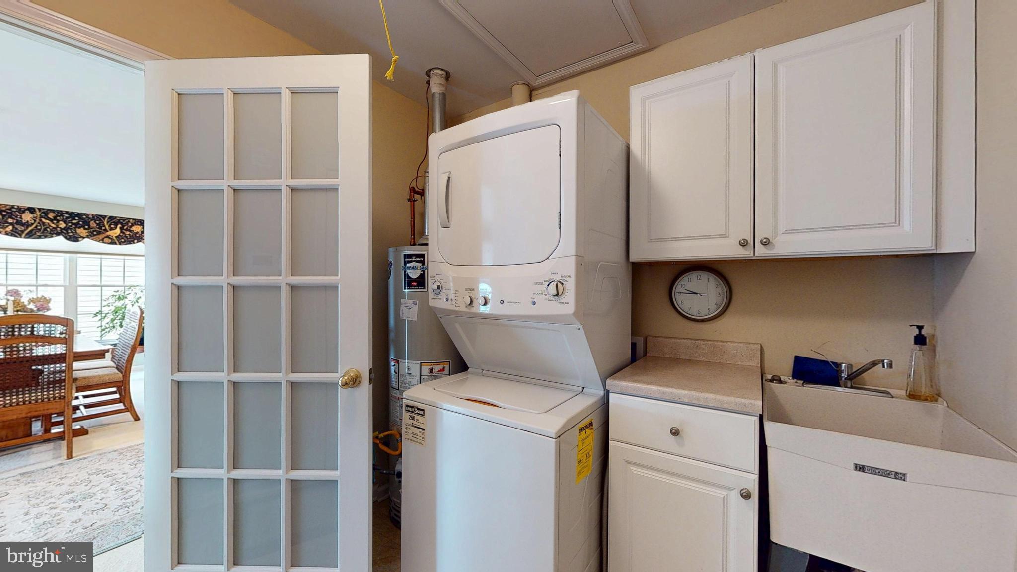 15 Carriage Berlin, NJ 08009 - Photo 49 of 61 a kitchen with a refrigerator and cabinets