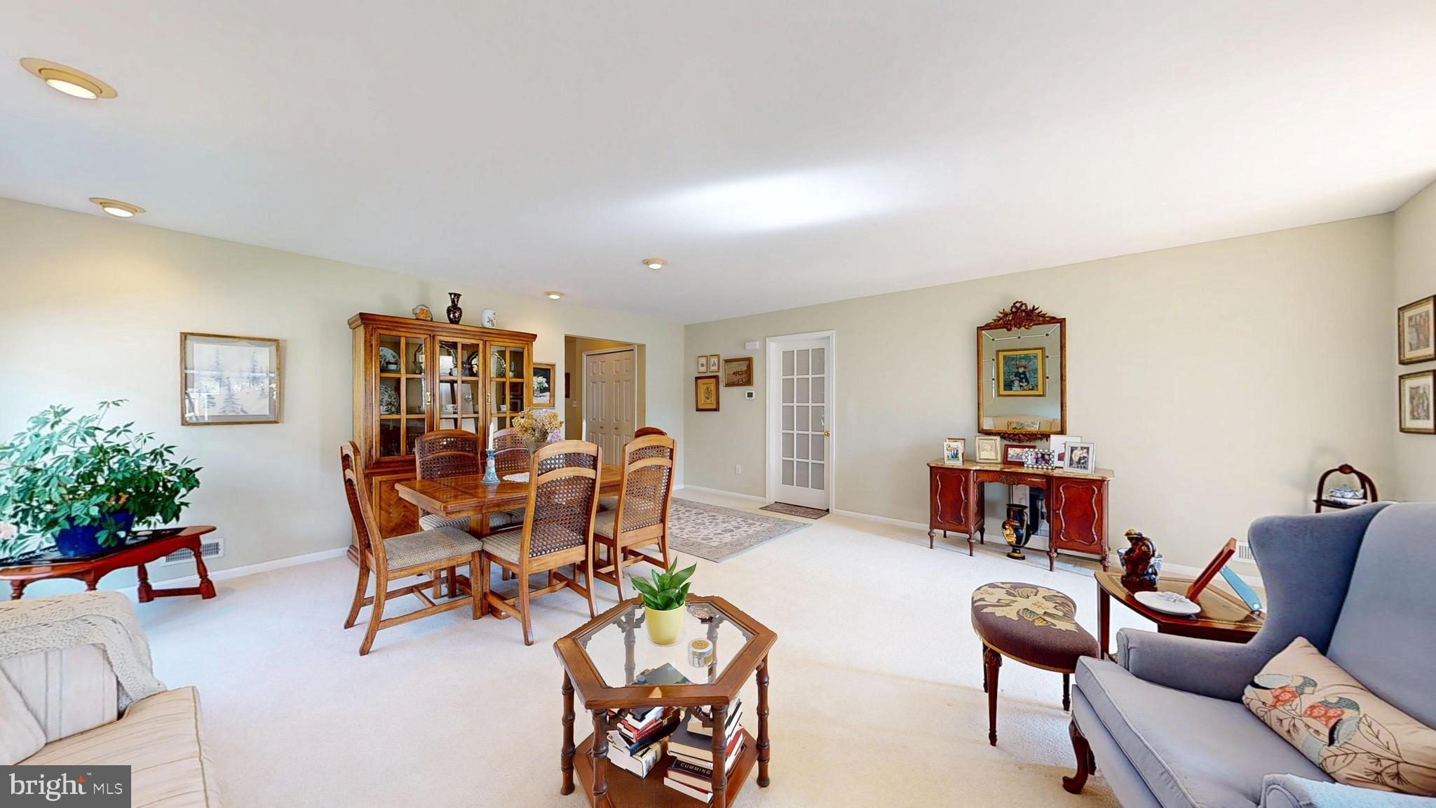 15 Carriage Berlin, NJ 08009 - Photo 5 of 61 a living room with furniture and a potted plant