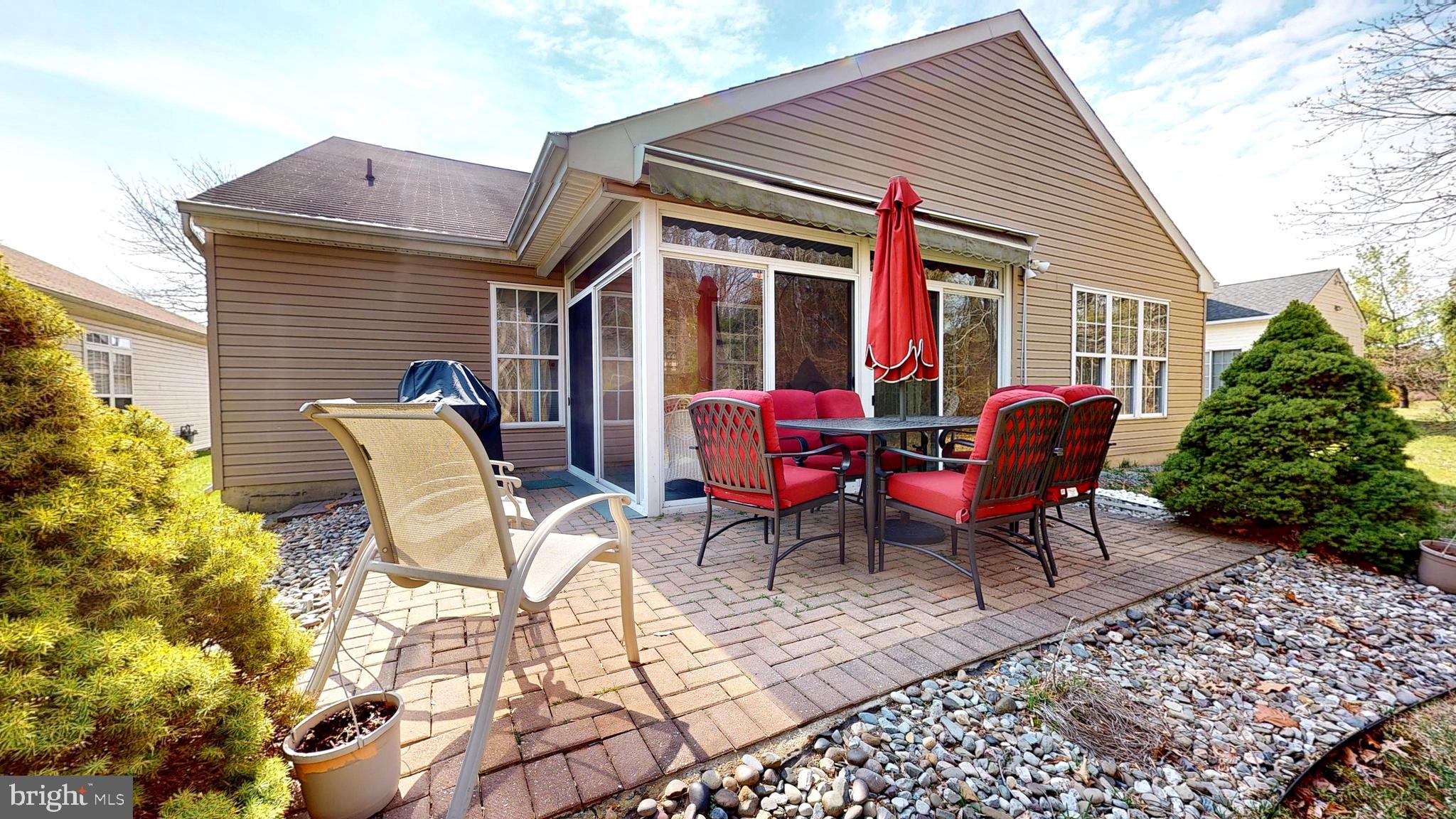 15 Carriage Berlin, NJ 08009 - Photo 53 of 61 a view of a house with a patio