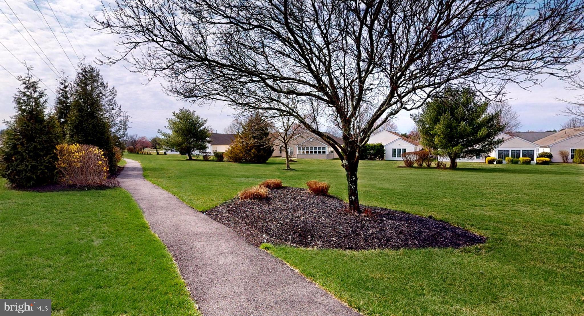 15 Carriage Berlin, NJ 08009 - Photo 54 of 61 a view of a garden with trees
