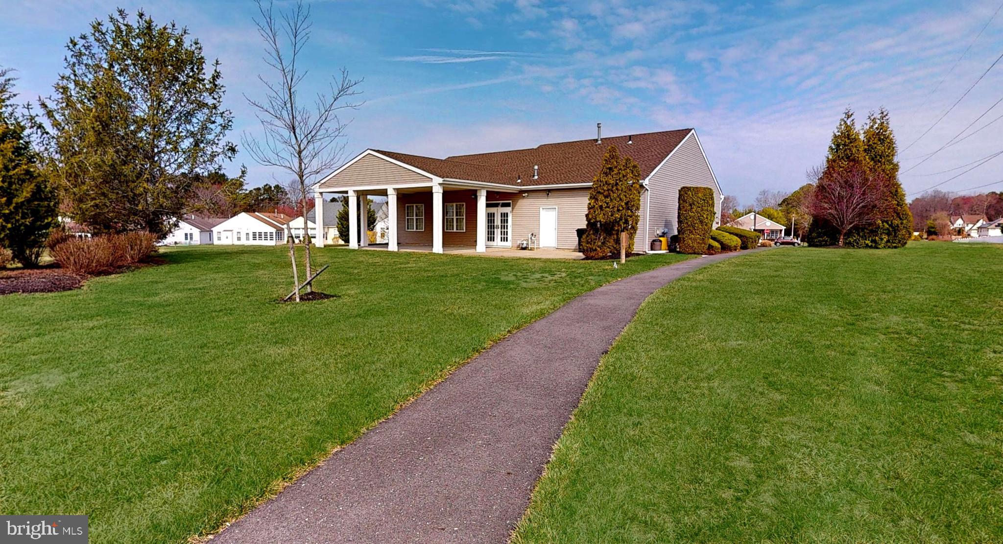 15 Carriage Berlin, NJ 08009 - Photo 55 of 61 a front view of a house with garden