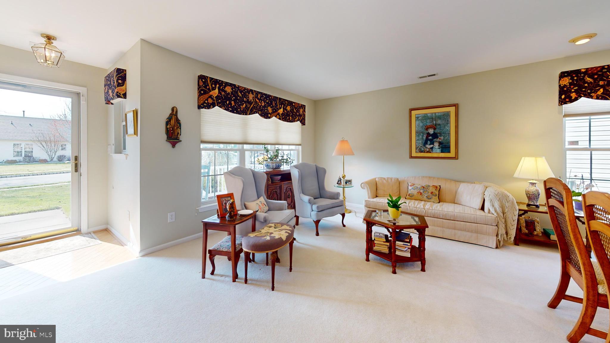 15 Carriage Berlin, NJ 08009 - Photo 6 of 61 a living room with furniture and a large window