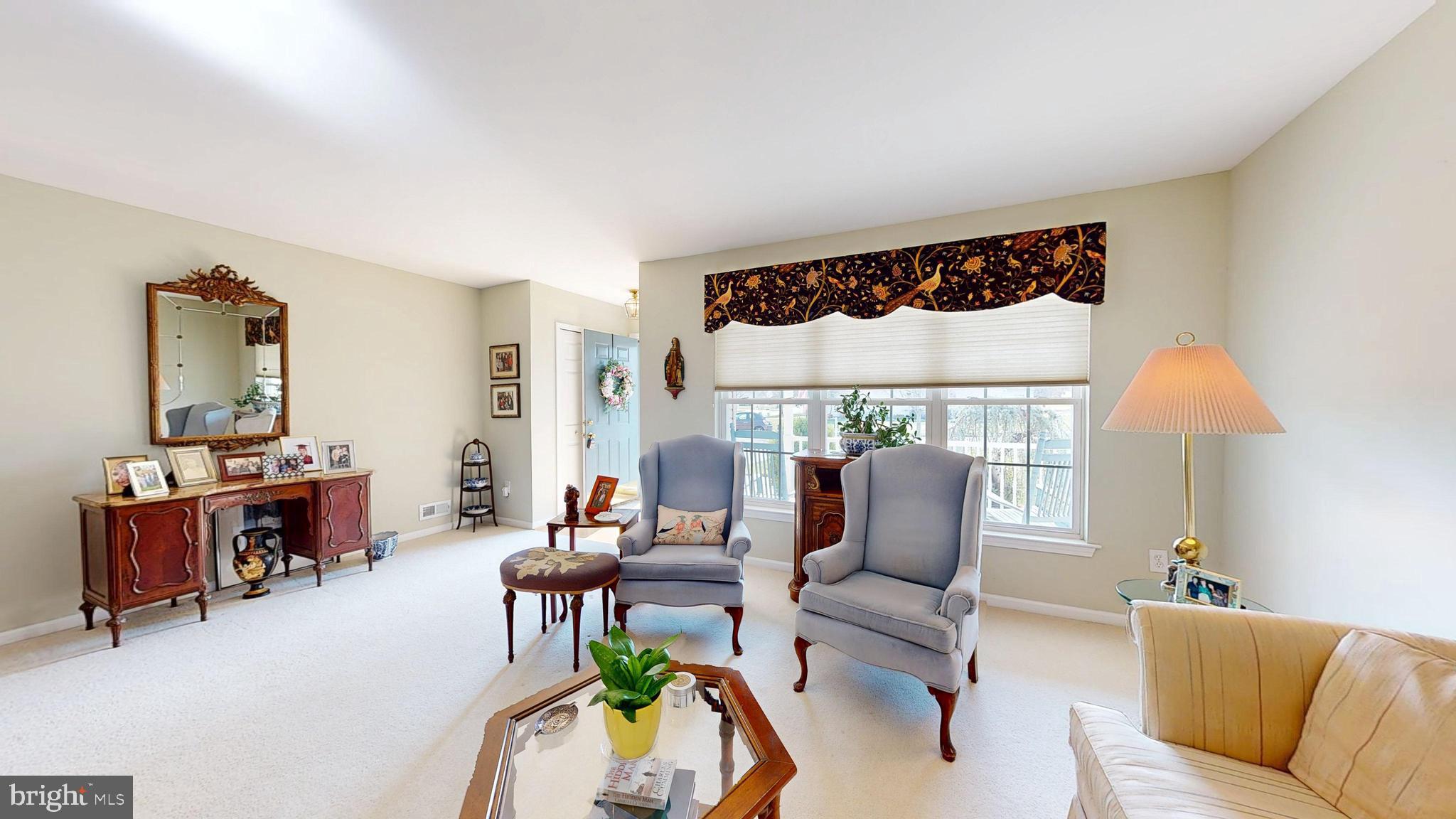 15 Carriage Berlin, NJ 08009 - Photo 7 of 61 a living room with furniture and a window
