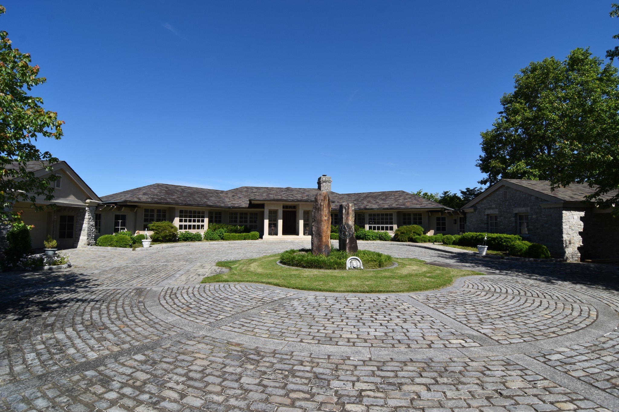 6300 Cairo Bend Road Lebanon, TN 37087 - Photo 1 of 50 a front view of a house with a yard garage and outdoor seating