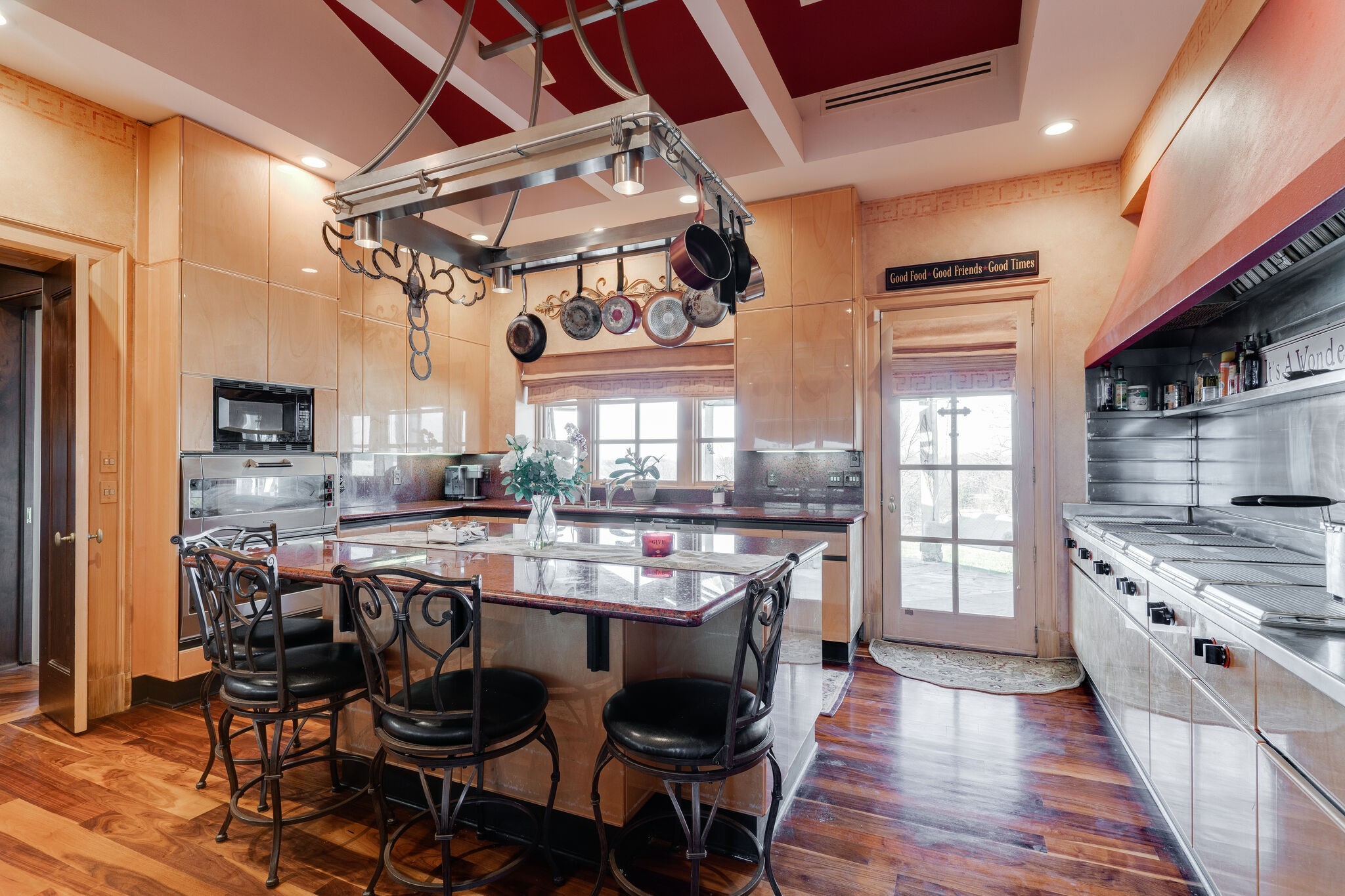 6300 Cairo Bend Road Lebanon, TN 37087 - Photo 12 of 50 a kitchen with stainless steel appliances granite countertop a stove and cabinets